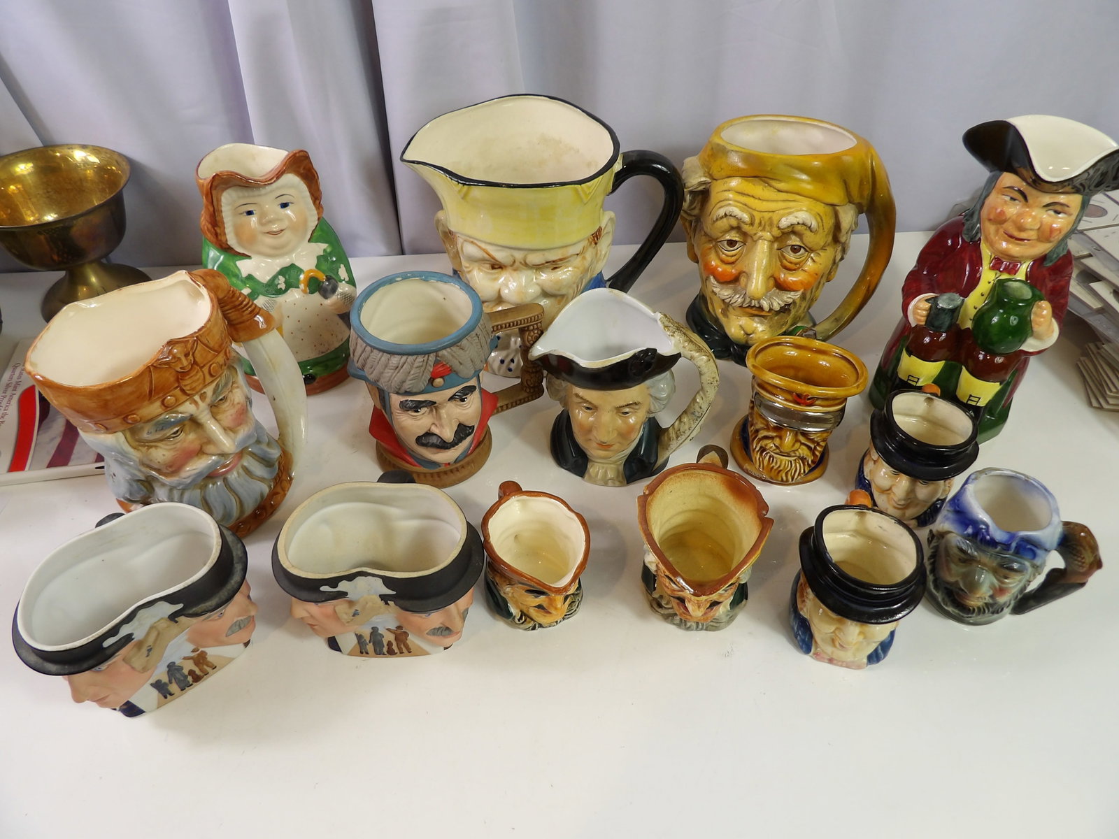 15 PCS.-Figural Mugs: Large Lot of 15 Figural Mugs. A Nice Collection. All measurements approximate. Please see photos for condition and details. Selling as is from 04281.