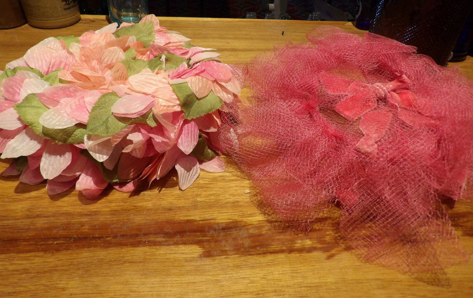 Pair Vintage Millinery Hats: Pair of Vintage Millinery Hats. One with Pink and Green Fabric Petals, One with Pink Tulle. All measurements approximate. Please see photos for condition and details. Selling as is from 04281.