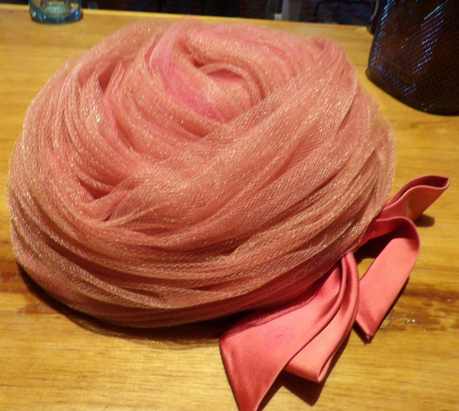 Vintage Danciger Hat with Pink Mesh: Vintage Danciger Hat with Pink Mesh, Tulle Fabric. All measurements approximate. Please see photos for condition and details. Selling as is from 04281.