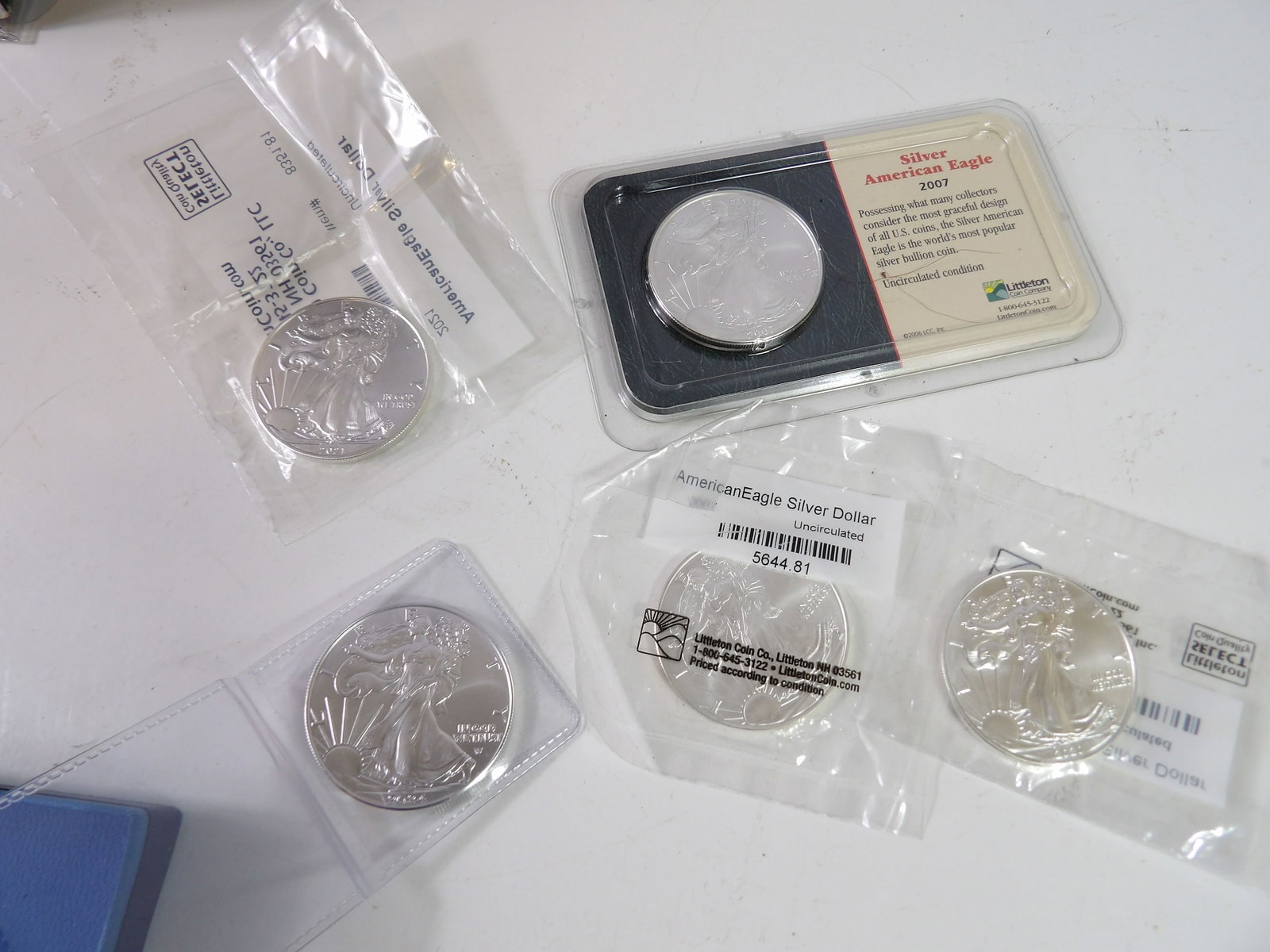 5 PCS.-Silver American Eagles: Lot of 5 Silver American Eagles. All Uncirculated. All measurements approximate. Please see photos for condition and details. Selling as is from 04281.