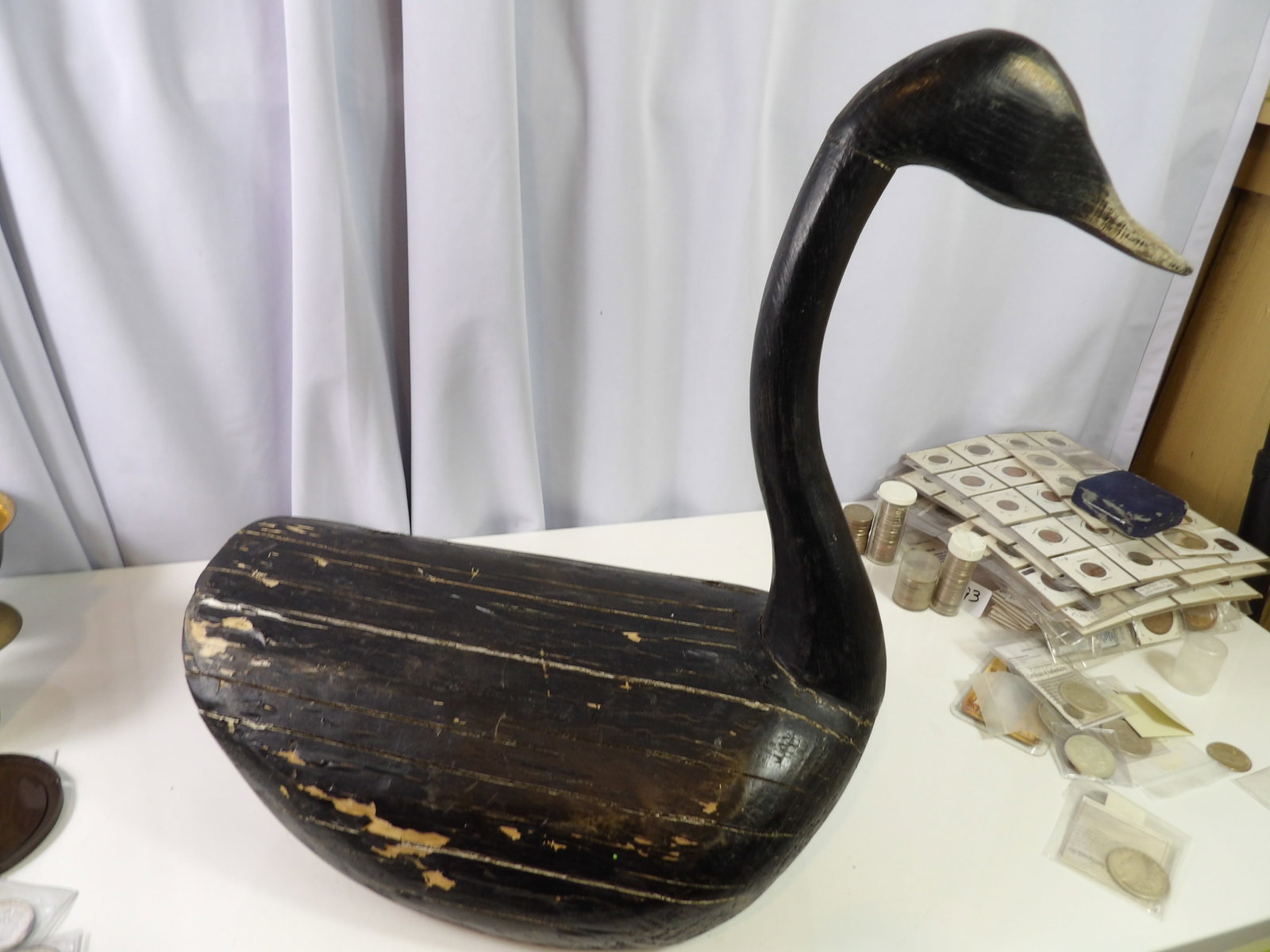 Vintage Wooden Carved Black Swan Decoy: Vintage Wooden Carved Black Swan Decoy. Shows Painted Details and has some Age Associated Wear . All measurements approximate. Please see photos for condition and details. Selling as is from 04281.