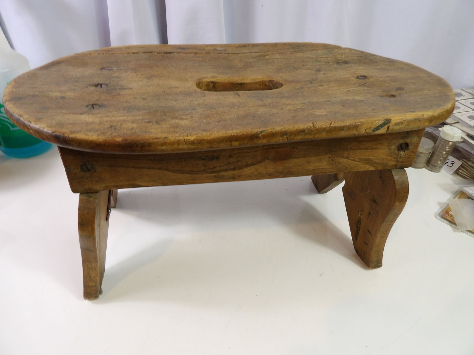 Vintage Footstool: Vintage Rustic Footstool with Oval Top and Hand Carved Legs. All measurements approximate. Please see photos for condition and details. Selling as is from 04281.