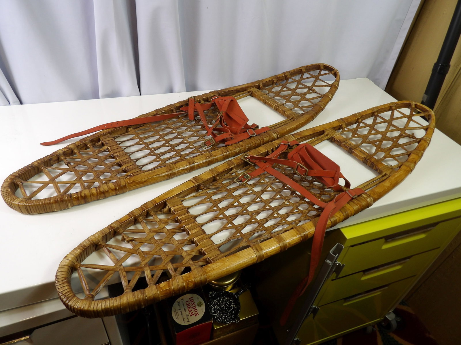 Pair of Early Canadian Snowshoes: Nice Pair of Early Wood and Leather Canadian Snowshoes. 36". Great Condition. All measurements approximate. Please see photos for condition and details. Selling as is from 04281.