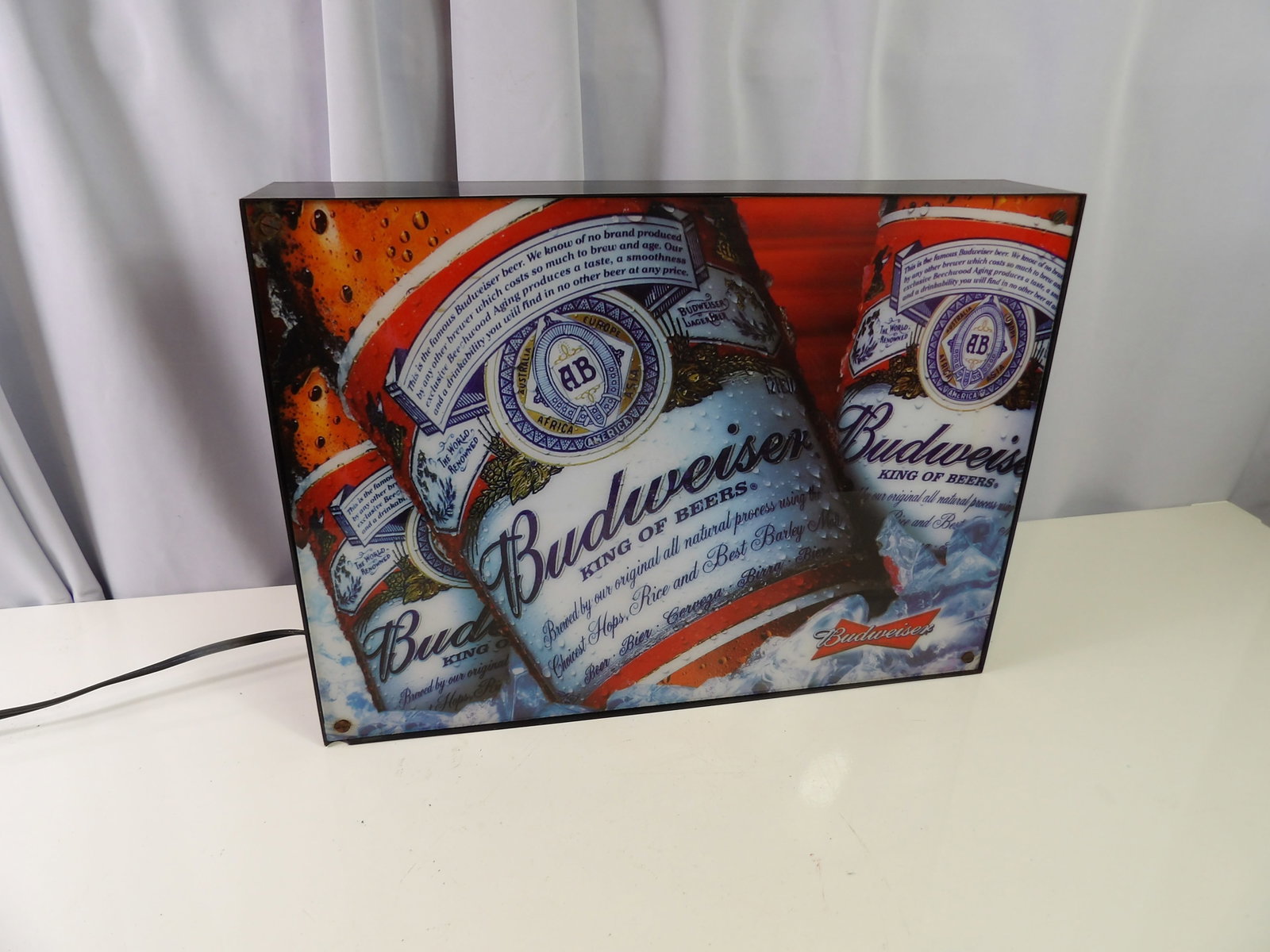 Budweiser Internally Lit Box Sign: 14" X 18" Budweiser Internally Lit Box Sign. All measurements approximate. Please see photos for condition and details. Selling as is from 04281.