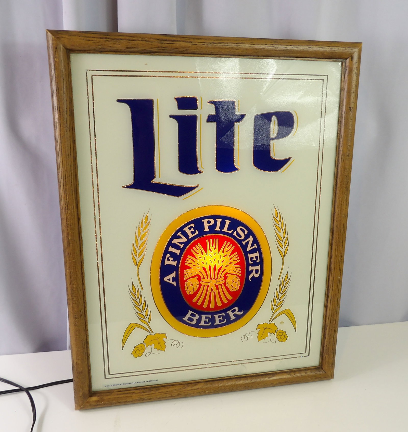 Lite Beer Internally Lit Sign: 16" X 22" Lite Beer Internally Lit Sign. All measurements approximate. Please see photos for condition and details. Selling as is from 04281.