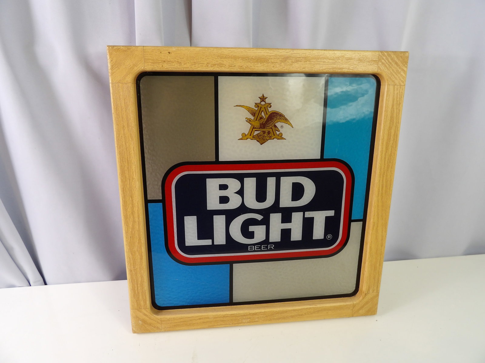 Bud Light Hanging Sign: 16" X 17" Bud Light Hanging Sign. All measurements approximate. Please see photos for condition and details. Selling as is from 04281.