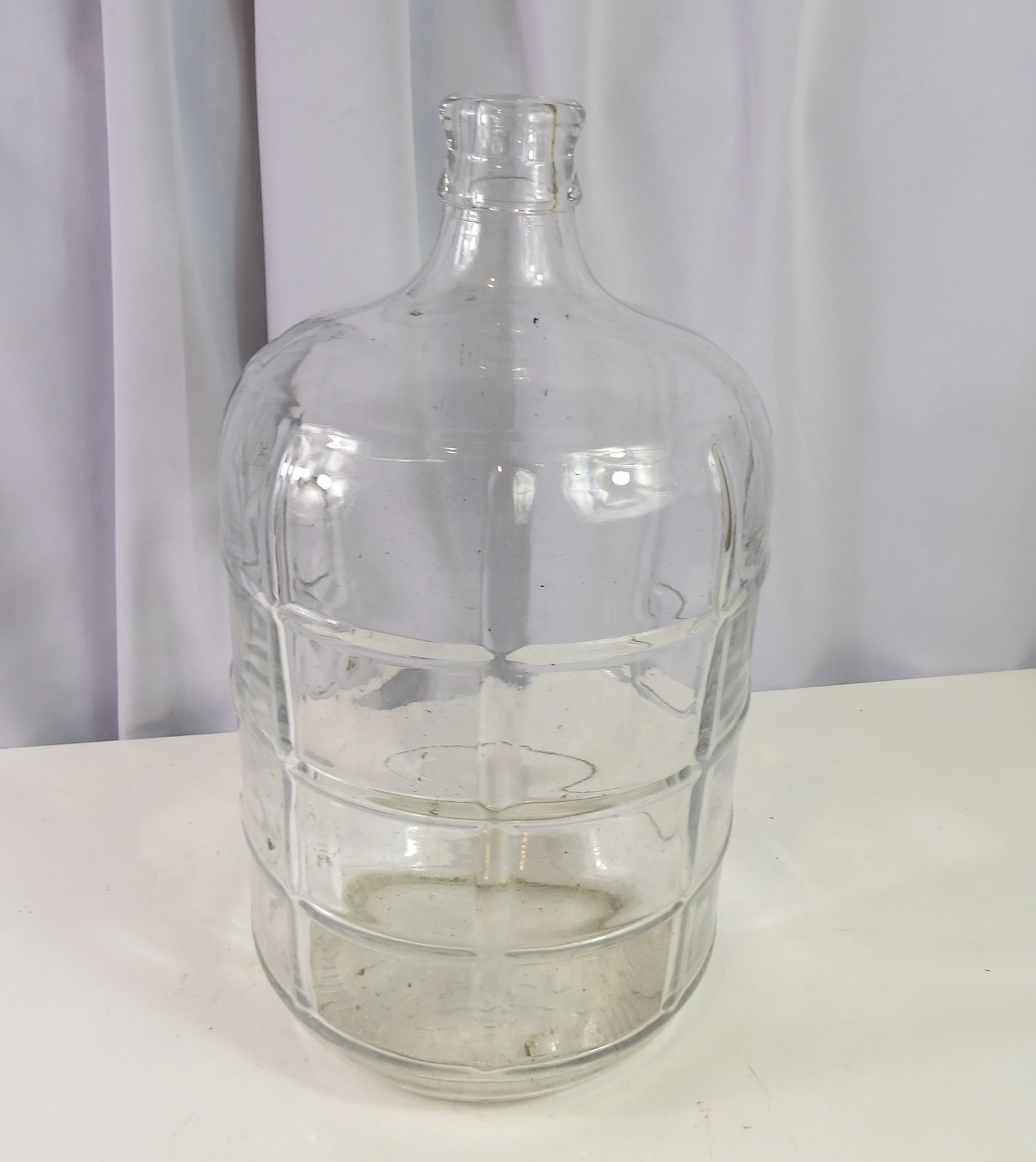 Large Vintage Italian Clear Glass Carboy Jug: Large Vintage Italian Clear Glass Carboy Jug with Grid Pattern. 3-5 Gallon. All measurements approximate. Please see photos for condition and details. Selling as is from 04281.
