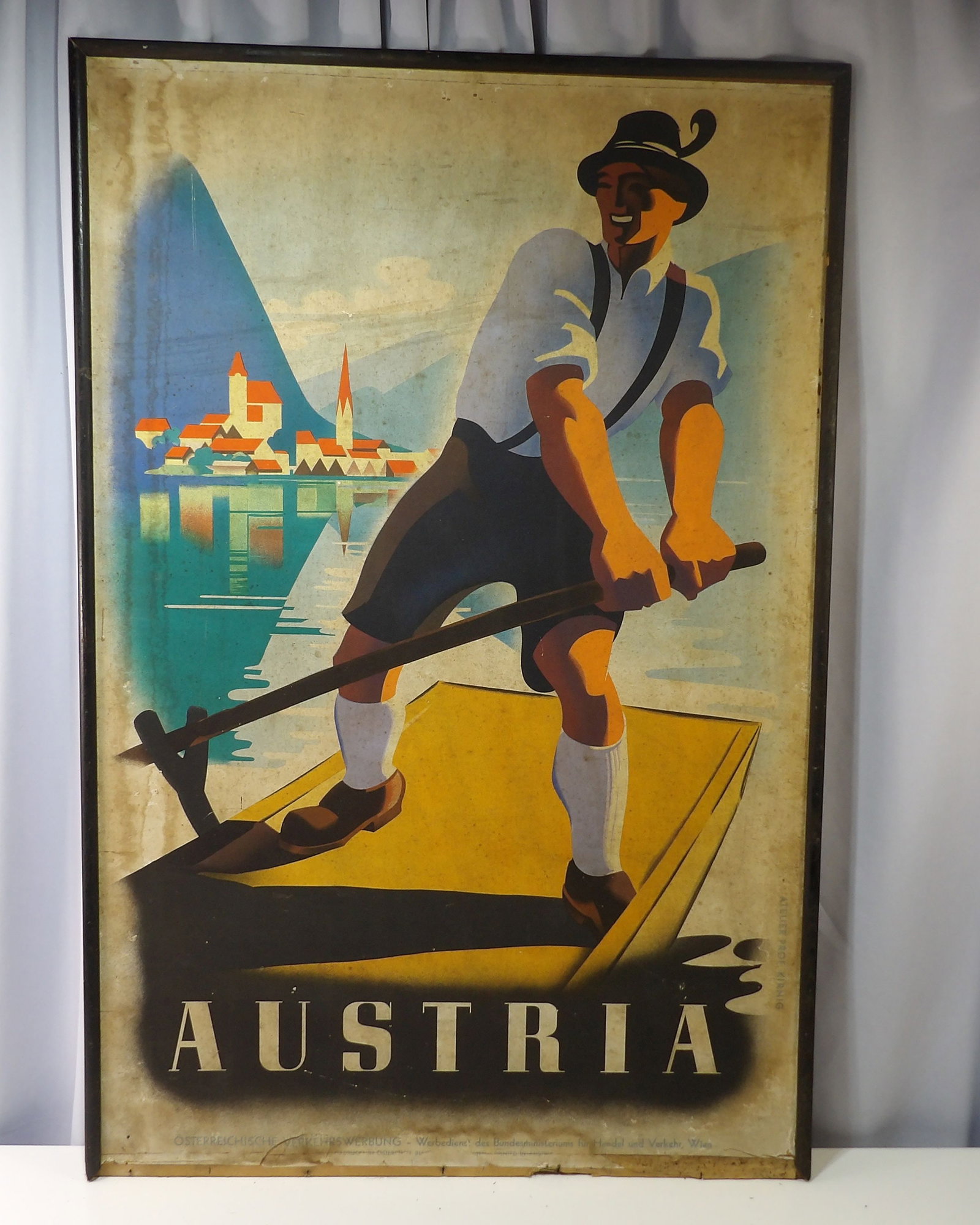 Vintage Austria Travel Poster: Vintage Austria Travel Poster featuring a Man Punting on a Lake. 25" X 39" All measurements approximate. Please see photos for condition and details. Selling as is from 04281.