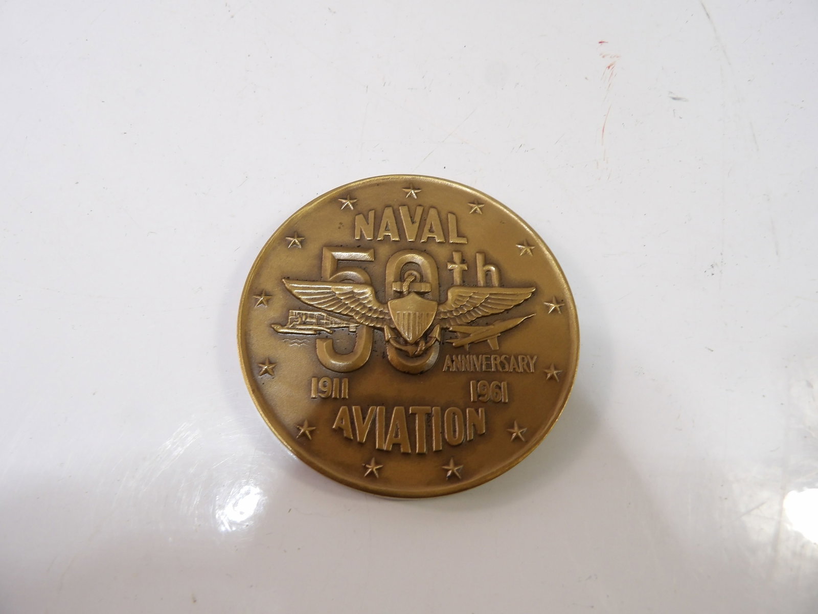 1961 Naval Aviation 50th Anniversary Bronze Metal: 1961 Naval Aviation 50th Anniversary Bronze Medal Commemorating 1911-1961. 2 1/2" Diameter. All measurements approximate. Please see photos for condition and details. Selling as is from 04281.