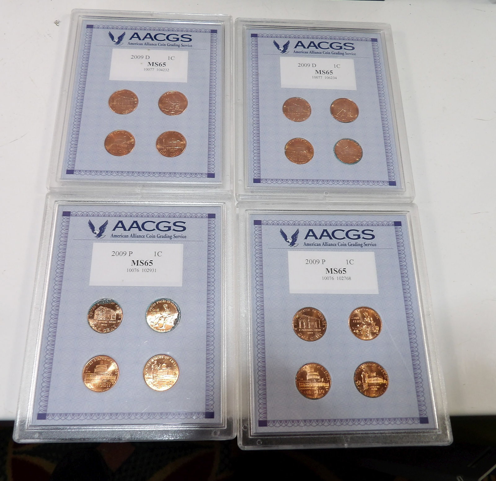 Set of 4 Lincoln Cents, 2009 MS65: Set of 4, 2009 Lincoln Cents. MS65 Graded by AACGS. All measurements approximate. Please see photos for condition and details. Selling as is from 04281.