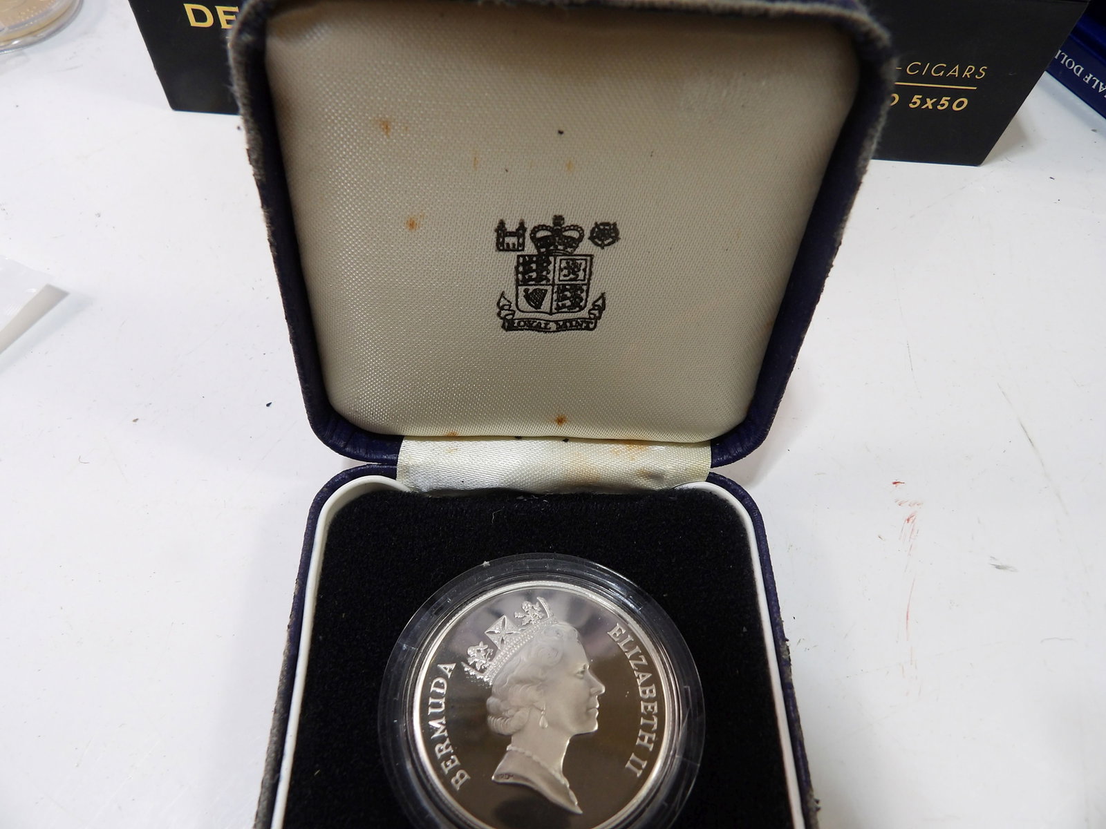 1 Oz. Elizabeth II Silver Coin: Elizabeth II 1 oz. Silver Coin. All measurements approximate. Please see photos for condition and details. Selling as is from 04281.