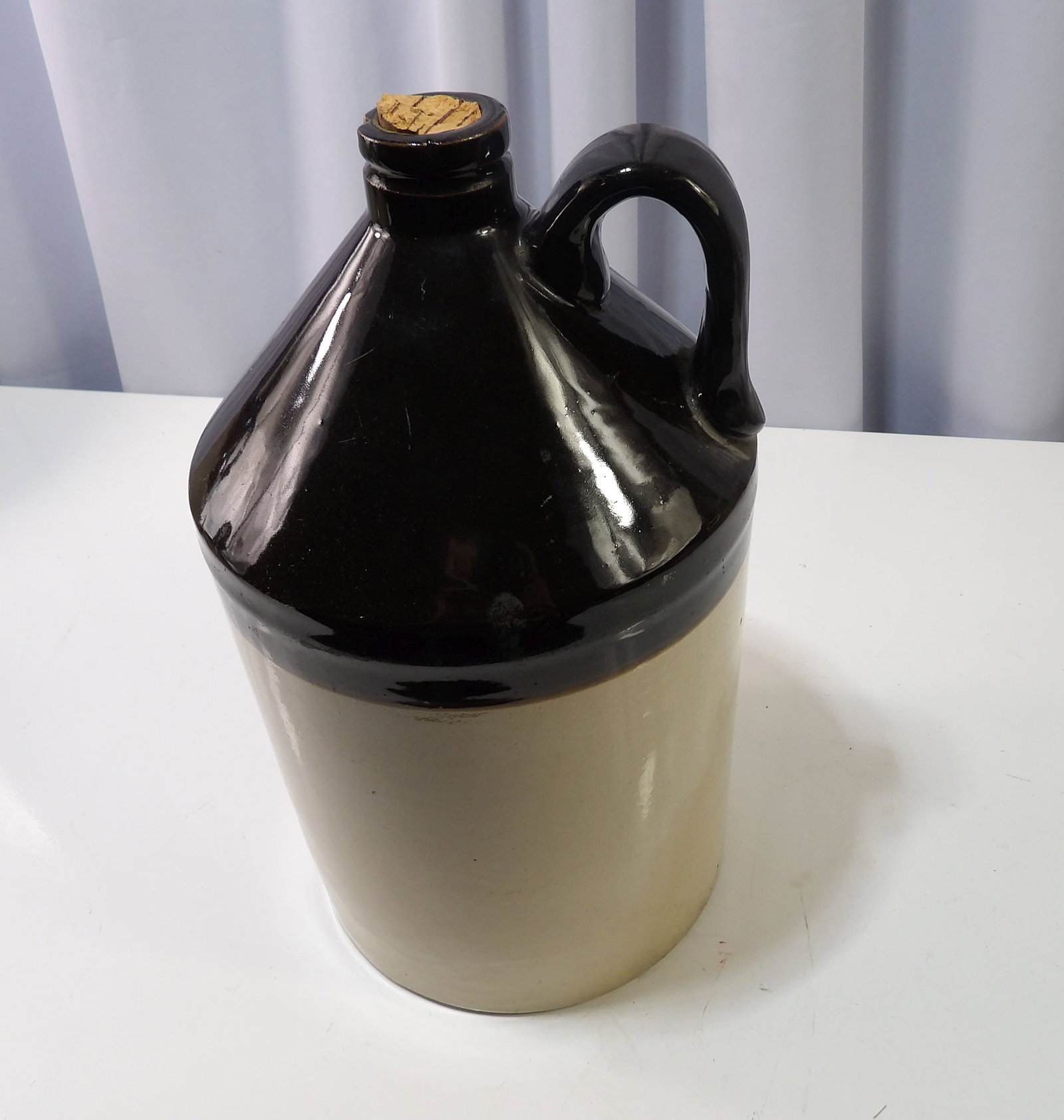 Vintage Two-Toned Stoneware Jug: Vintage Two-Toned Stoneware Jug. Very Good Condition. All measurements approximate. Please see photos for condition and details. Selling as is from 04281.