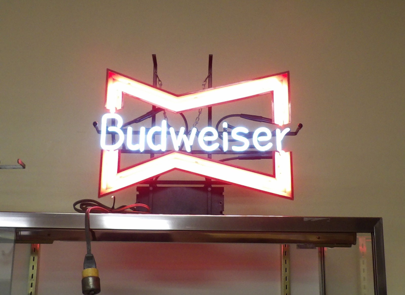 Budweiser Bowtie Neon Sign: Budweiser Bowtie Neon Sign. Working Condition. All measurements approximate. Please see photos for condition and details. Selling as is from 04281.