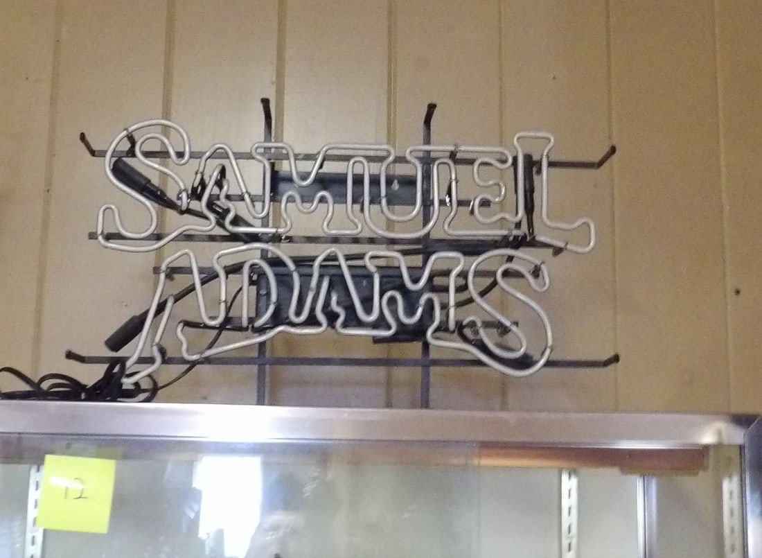 Samuel Adams Neon Sign: Samuel Adams Neon Sign. Not Working. (Glass appears to be intact.) All measurements approximate. Please see photos for condition and details. Selling as is from 04281.