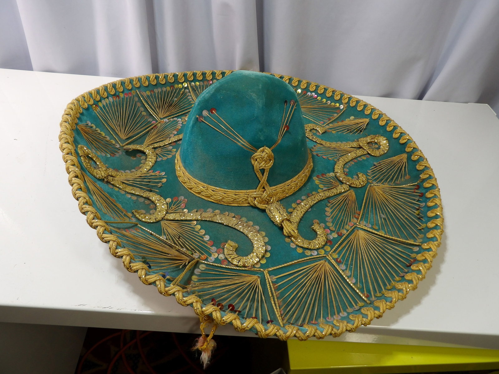 Teal and Gold Velvet Sombrero Hat, Salazar Mariachi: Teal and Gold Velvet Sombrero Salazar Mariachi Hat. All measurements approximate. Please see photos for condition and details. Selling as is from 04281.