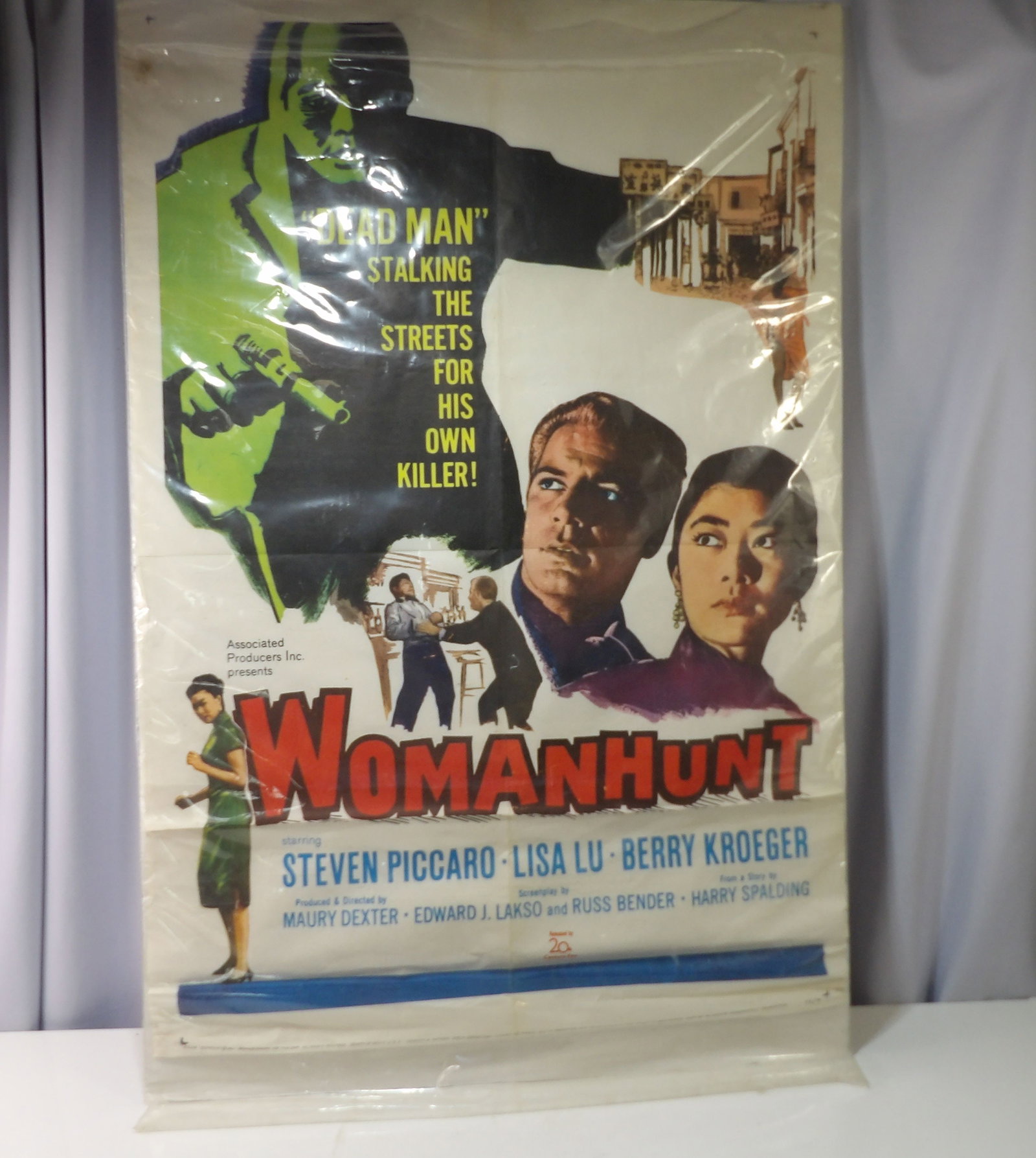 1961 Original "Womanhunt" Movie Poster: Vintage 1961 Original "Womanhunt" Movie Poster, Starring Steven Piccaro and Lisa Lu. All measurements approximate. Please see photos for condition and details. Selling as is from 04281.