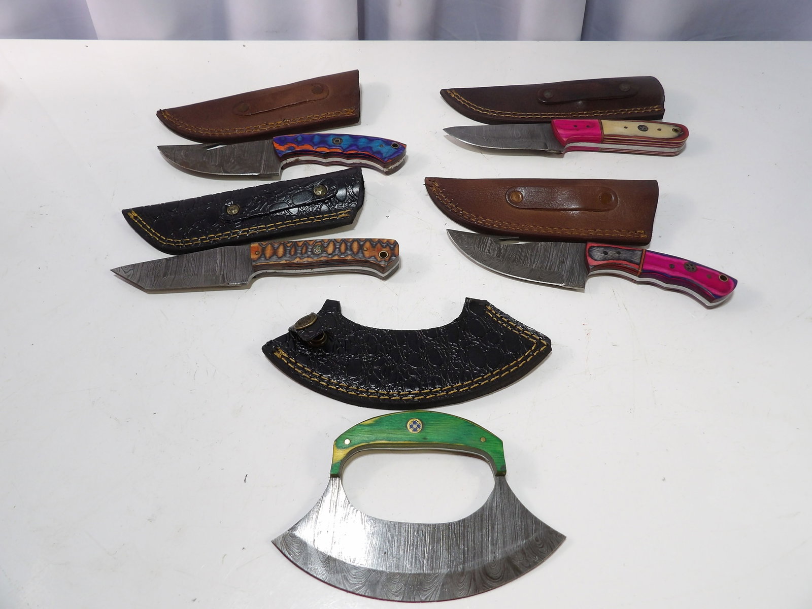 Lot of 5 Handmade Damascus Steel Blades with Sheaths: Lot of 5 New Handmade Damascus Steel Blades with Leather Sheaths. All measurements approximate. Please see photos for condition and details. Selling as is from 04281.