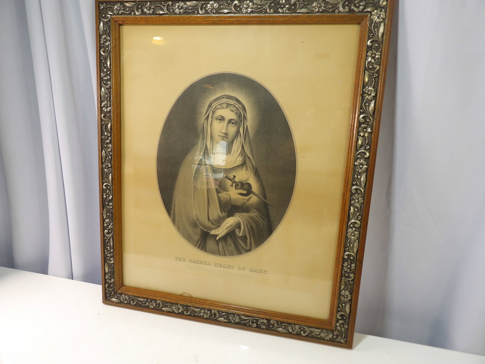 Vintage Decorative Framed Print, The Sacred Heart of Mary: Vintage Framed Print of "The Sacred Heart of Mary" with Decorative Frame. 22" X 26". Circa 1882. All measurements approximate. Please see photos for condition and details. Selling as is from 04281.