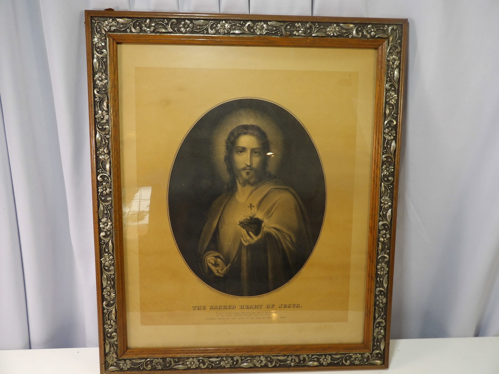 Vintage Decorative Framed Print, The Sacred Heart of Jesus: Vintage Framed Print of "The Sacred Heart of Jesus" with Decorative Frame. 22" X 26". Circa 1882. All measurements approximate. Please see photos for condition and details. Selling as is from 04281.