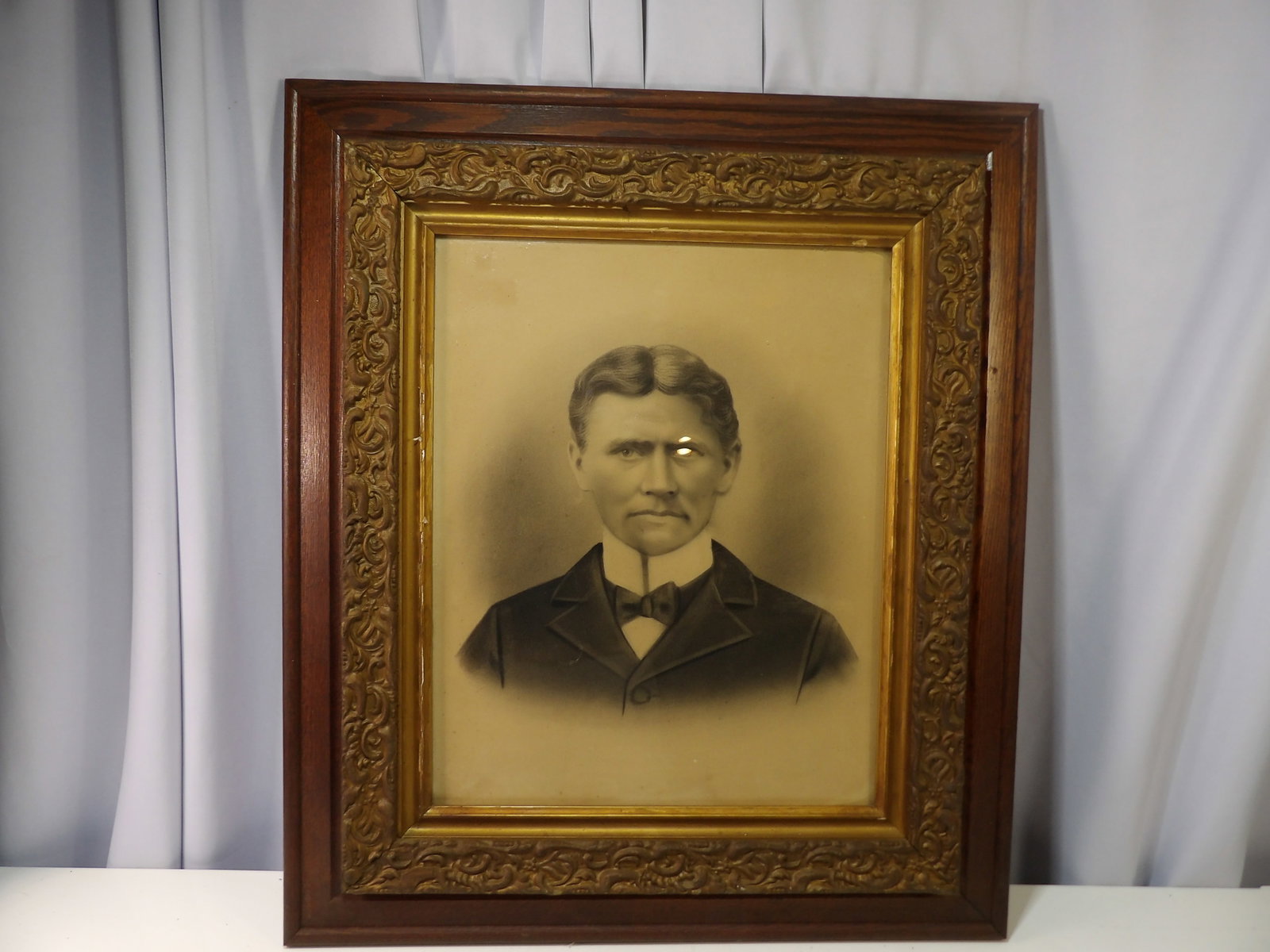 Early Charcoal Portrait, Man with Bowtie: Early Framed Charcoal Portrait of A Man with Bowtie. Amazing 25" X 30" Oak Frame. Excellent Condition. All measurements approximate. Please see photos for condition and details. Selling as is from