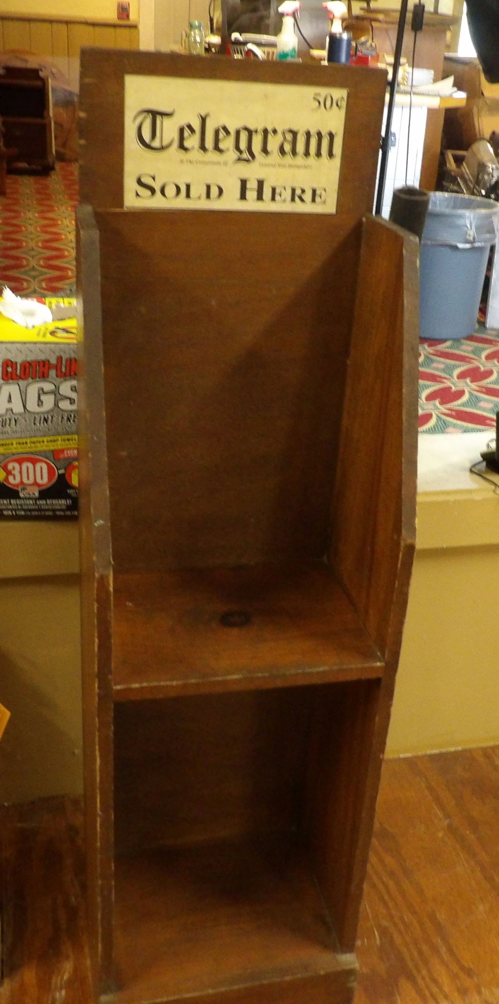 Vintage Wooden Display Stand "Telegra Sold Here": Vintage Wooden "Telegram Sold Here" Display Stand. All measurements approximate. Please see photos for condition and details. Selling as is from 04281.