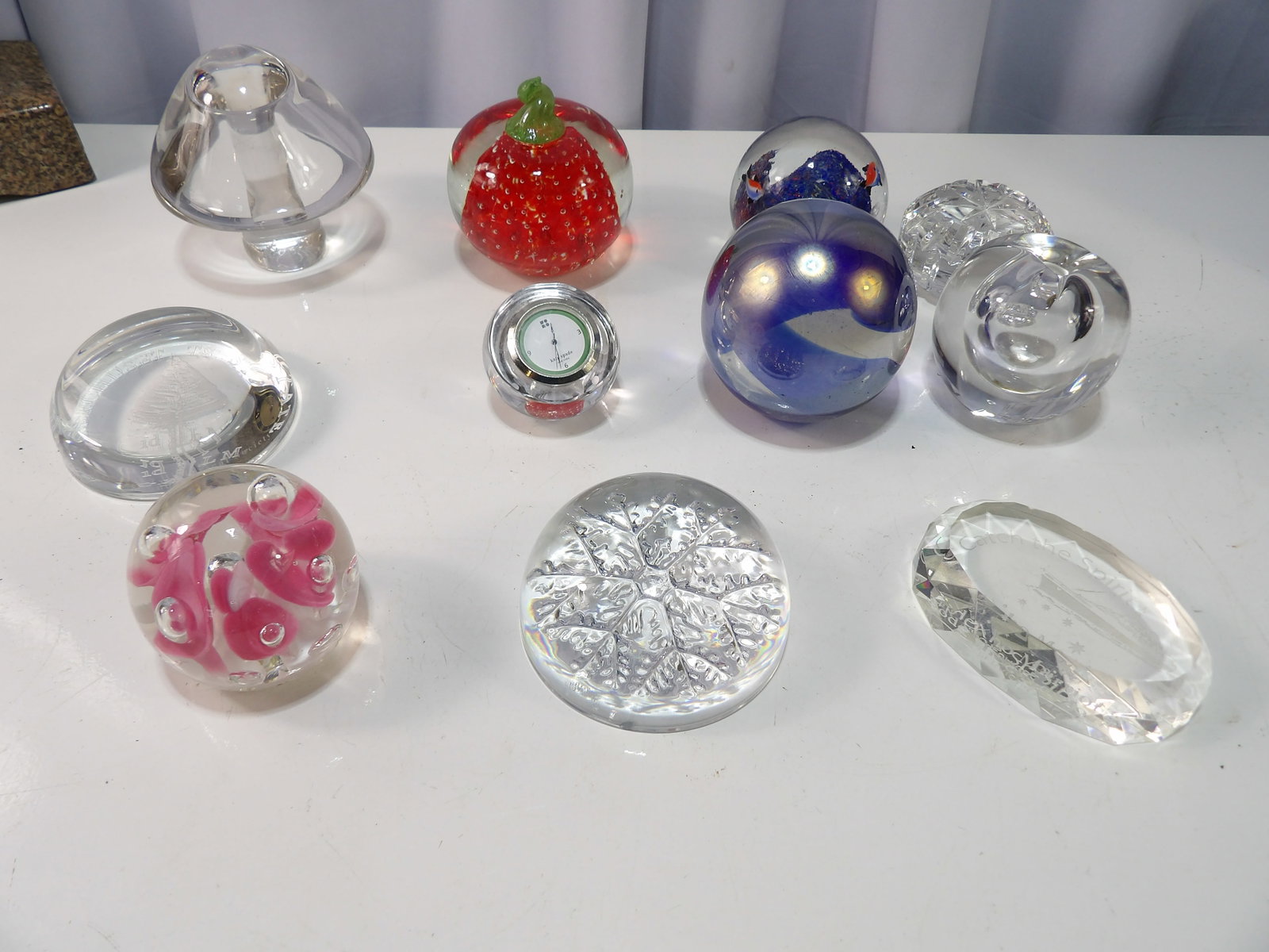 Assorted Glass Paperweights, 11 pcs: 11 AssortedDecorative Art Glass Paperweights. All measurements approximate. Please see photos for condition and details. Selling as is from 04281.
