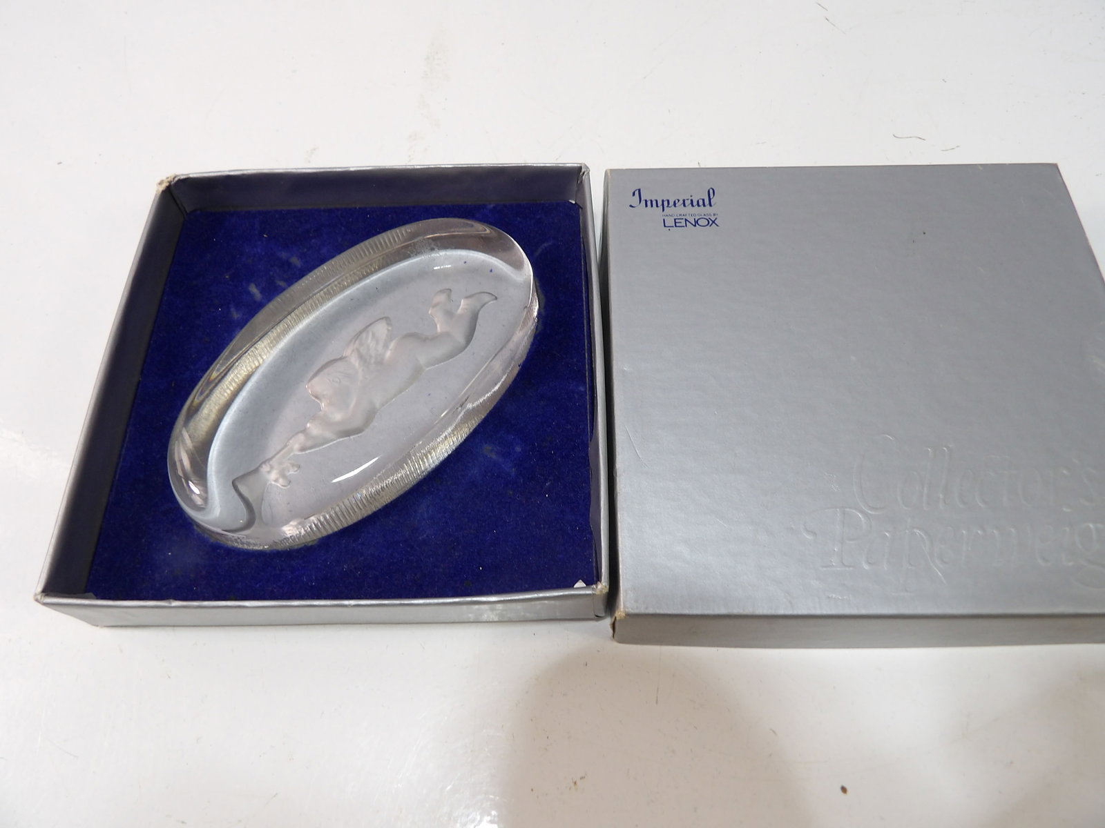 Imperial Lenox Glass Oval Paperweight: Imperial Lenox Clear Glass Oval Paperweight with Frosted Angel Design. All measurements approximate. Please see photos for condition and details. Selling as is from 04281.
