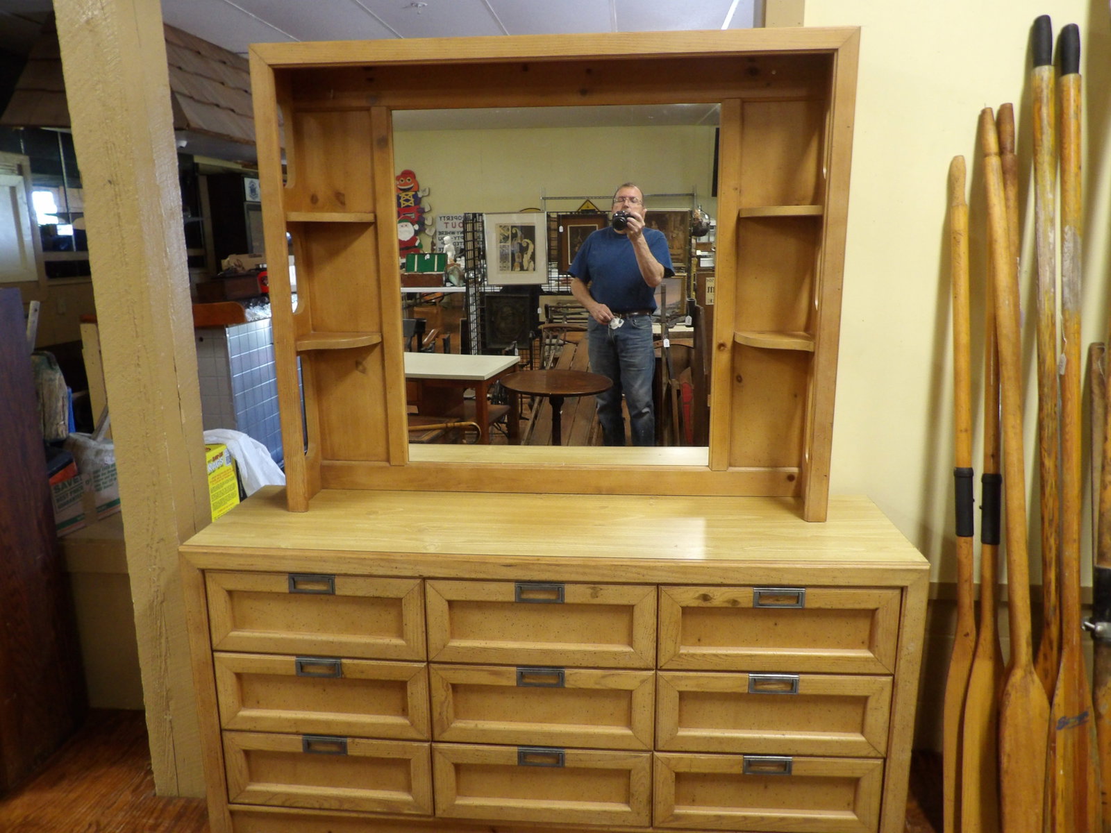 Nine Drawer Dresser: Nice Dresser with 9 Drawers and Integrated Mirror Hutch with Shelves. All measurements approximate. Please see photos for condition and details. Selling as is from 04281.