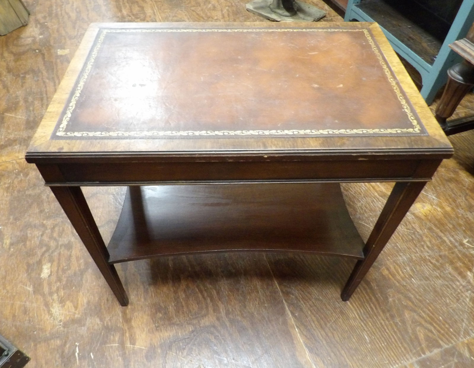 Vintage Mahogany Side Table: Vintage Mahogany Side Table with Tooled Leather Top. All measurements approximate. Please see photos for condition and details. Selling as is from 04281.