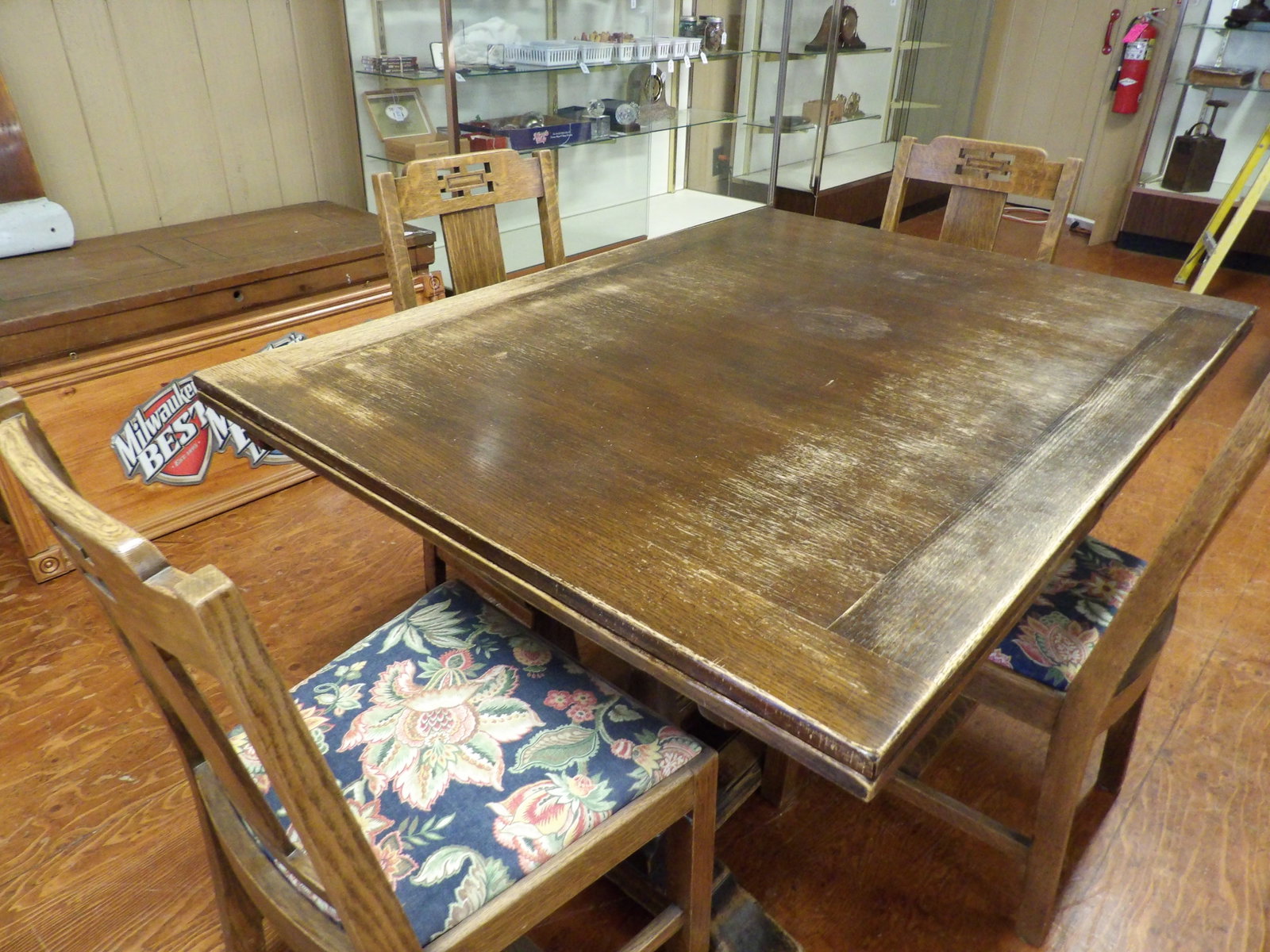 Slide Leaf Oak Table with Chairs: Beautiful Slide Leaf Oak Table and 4 Chairs. All measurements approximate. Please see photos for condition and details. Selling as is from 04281.