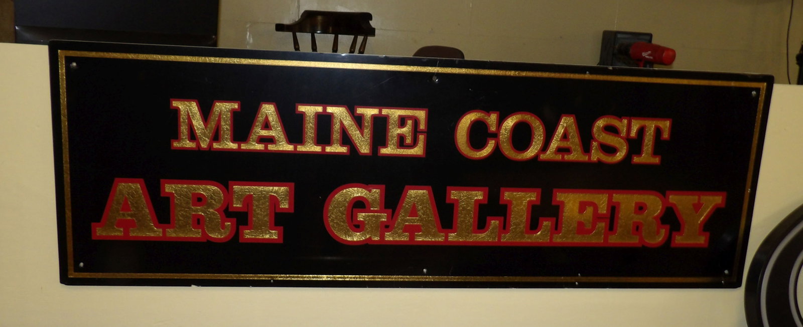 Vintage Maine Coast Art Gallery Sign: Beautiful Vintage Maine Coast Art Gallery Sign. Black with Gold and Red Lettering. 24" X 72". All measurements approximate. Please see photos for condition and details. Selling as is from 04281.