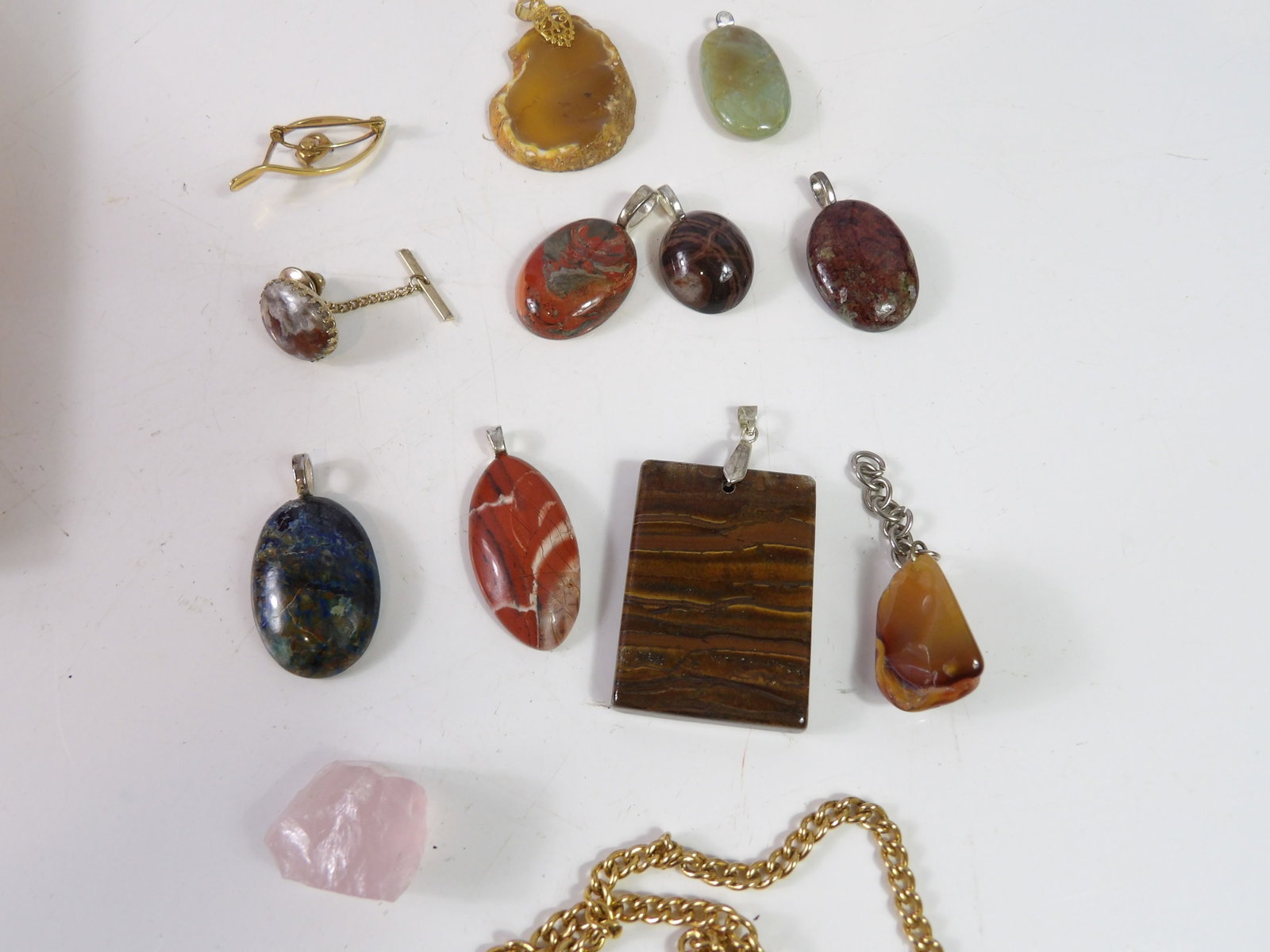 Assorted Gemstone Pendants: Collection of assorted Gemstone Pendants. All measurements approximate. Please see photos for condition and details. Selling as is from 04281.