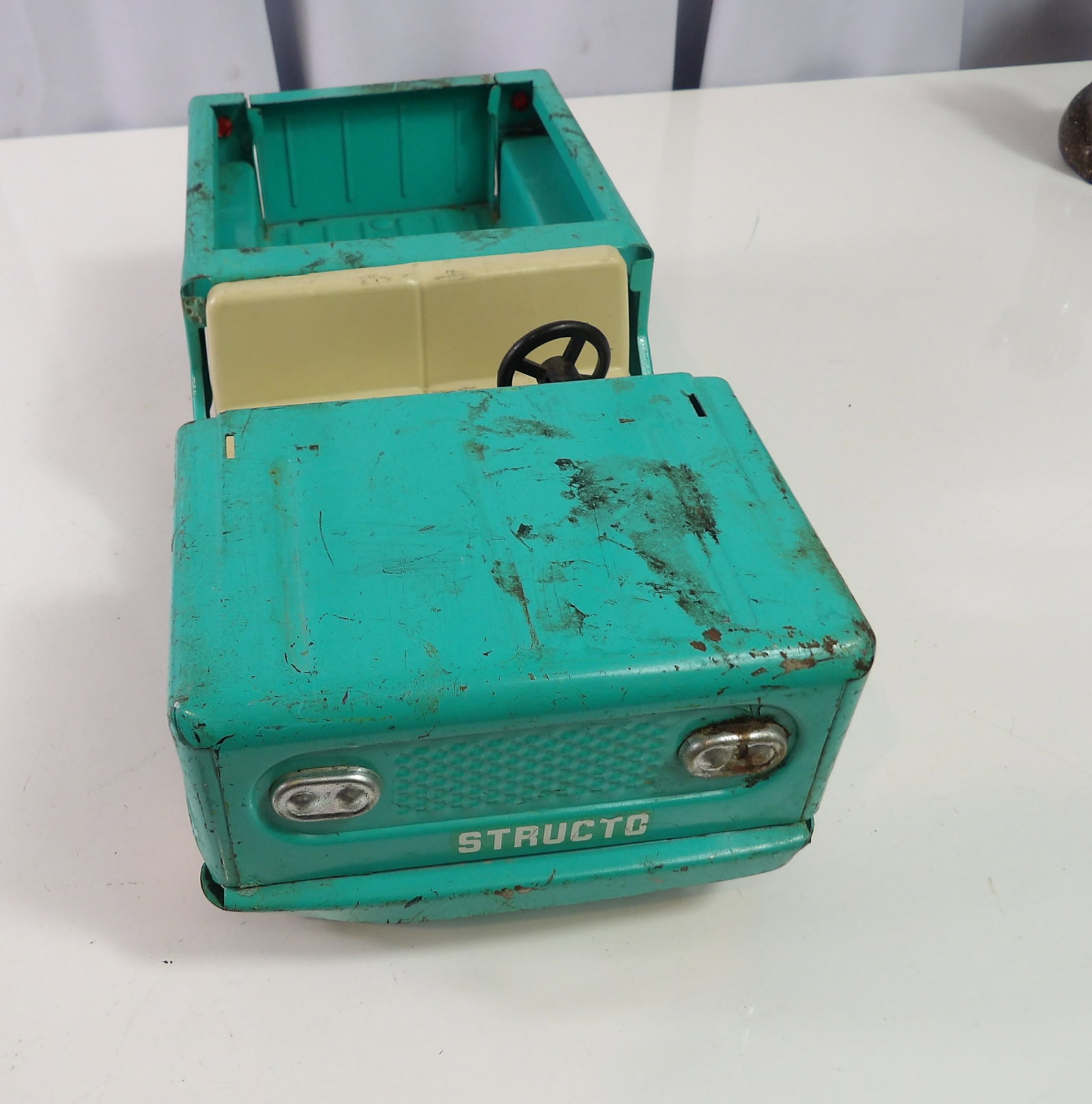 Vintage Structo International Scout toy jeep: Vintage Structo International Scout army cub Jeep, 10" long. All measurements approximate. Please see photos for condition and details. Selling as is from 04281.