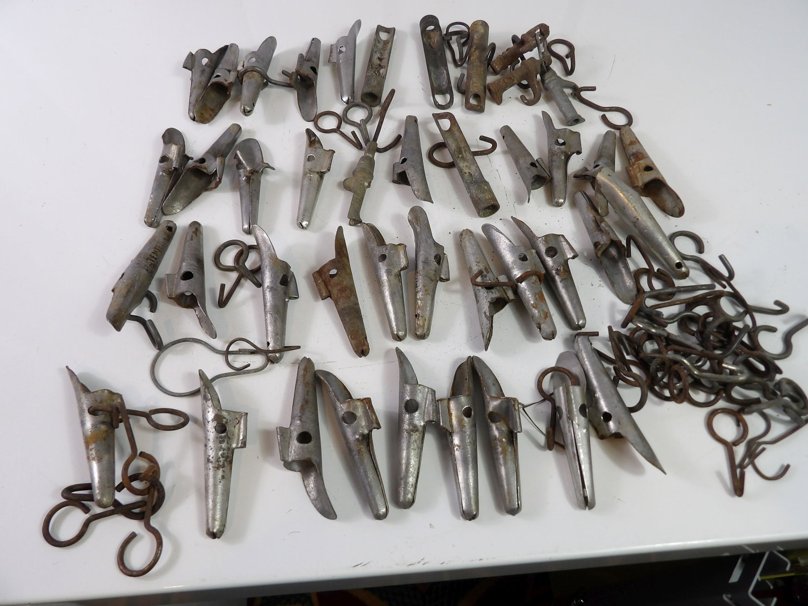 Vintage Maple Syrup Spouts: Large lot of vintage maple syrup spouts, sap bucket, spiles and taps. All measurements approximate. Please see photos for condition and details. Selling as is from 04281.