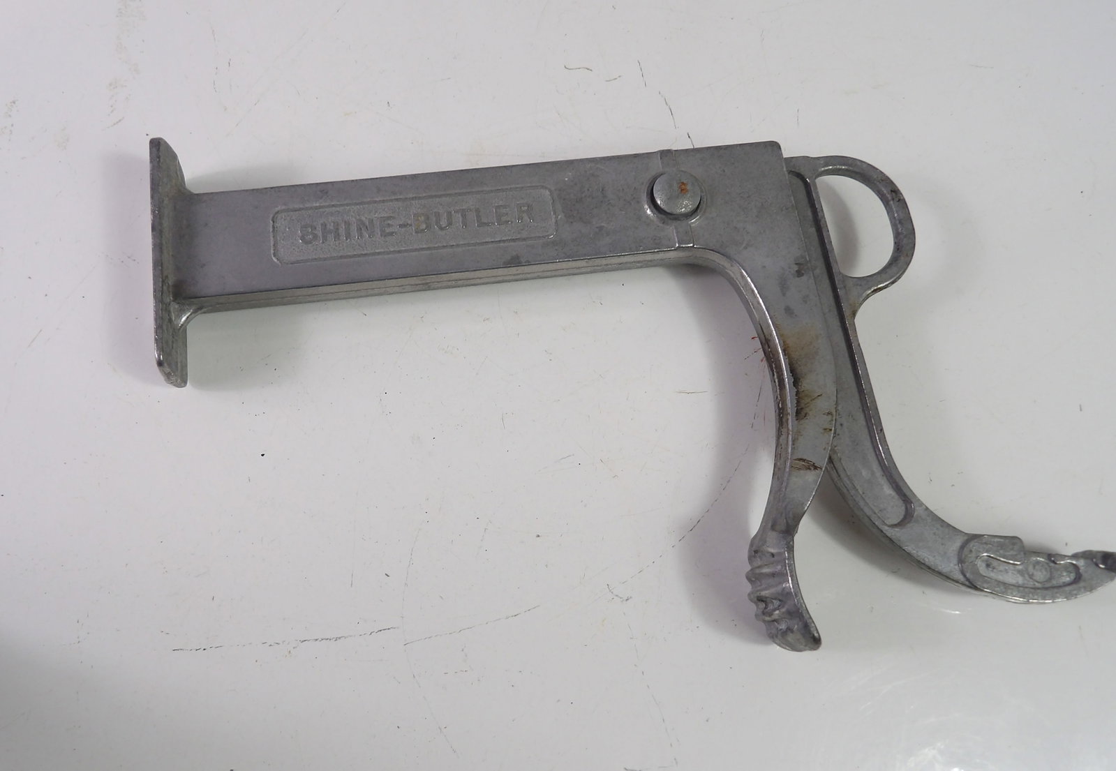 Vintage Shine Buller Shoe Shining Tool: Vintage Shine Buller shoe shining tool, cast aluminum. All measurements approximate. Please see photos for condition and details. Selling as is from 04281.