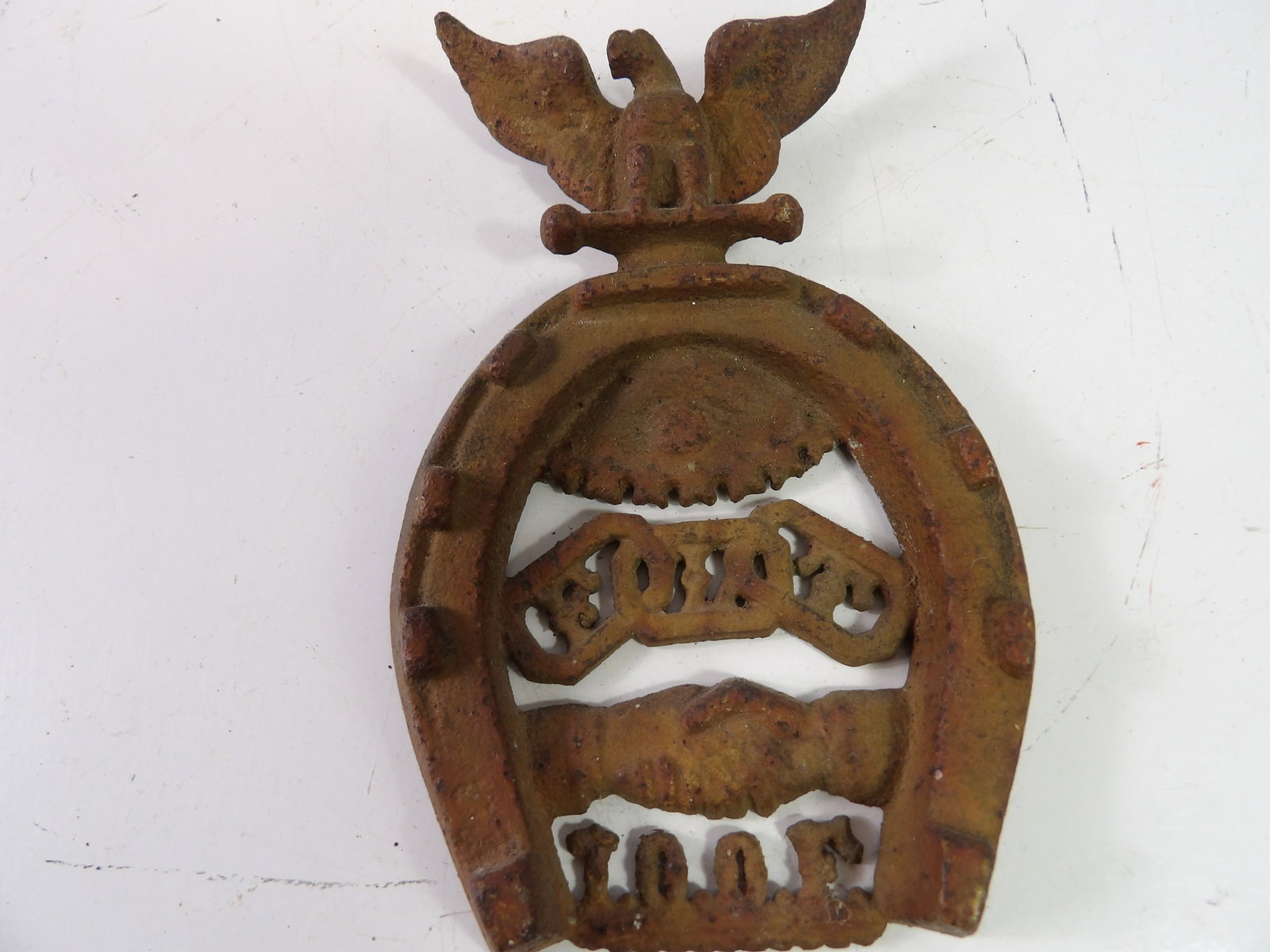 Oddfellows Cast Iron Memorabilia Horseshoe: Vintage Cast Iron Oddfellows Good Luck and Fraternal handshake Horseshoe with Eagle. All measurements approximate. Please see photos for condition and details. Selling as is from 04281.