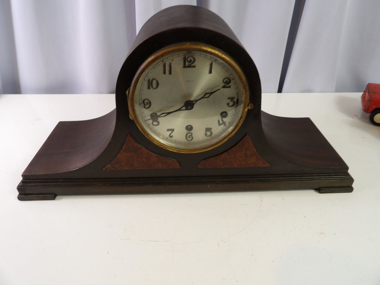 Vintage Kienzle Mantel Clock: Vintage Kienzle Mantel Clock with Art Deco Styling and Tambour Shape. All measurements approximate. Please see photos for condition and details. Selling as is from 04281.
