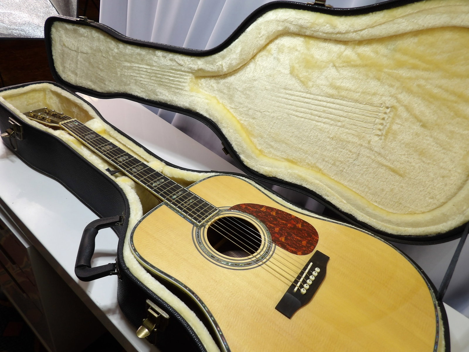 Martin D-45 Acoustic Guitar with Inlaid Fret Board: Martin D-45 Acoustic Guitar with Inlaid Fret Board and Headstock. In Excellent Condition with Nice Hardshell Case. We are not guitar experts or musicians. This guitar is in like new condition with no 