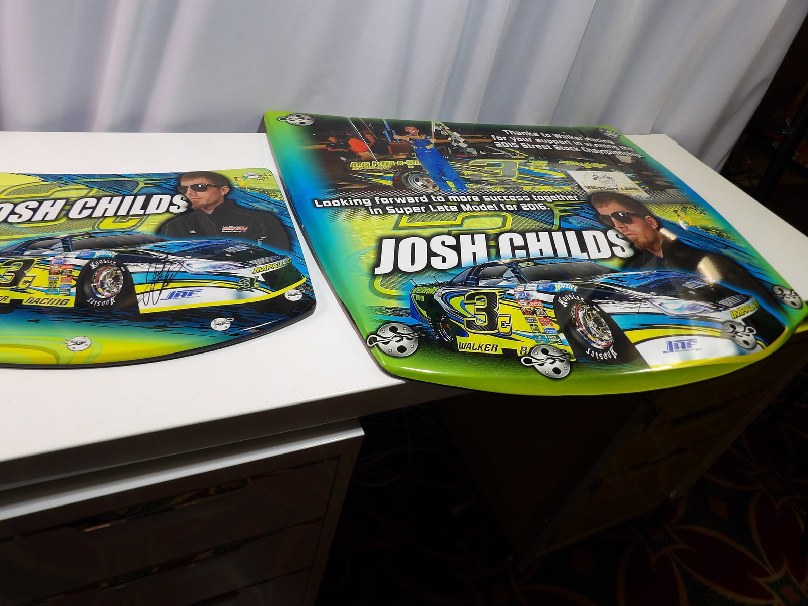 Pair of 2015 Josh Childs Racing Commemorative Metal Signs: Pair of Josh Childs Racing 2015 Commemorative Metal Signs. All measurements approximate. Please see photos for condition and details. Selling as is from 04281.