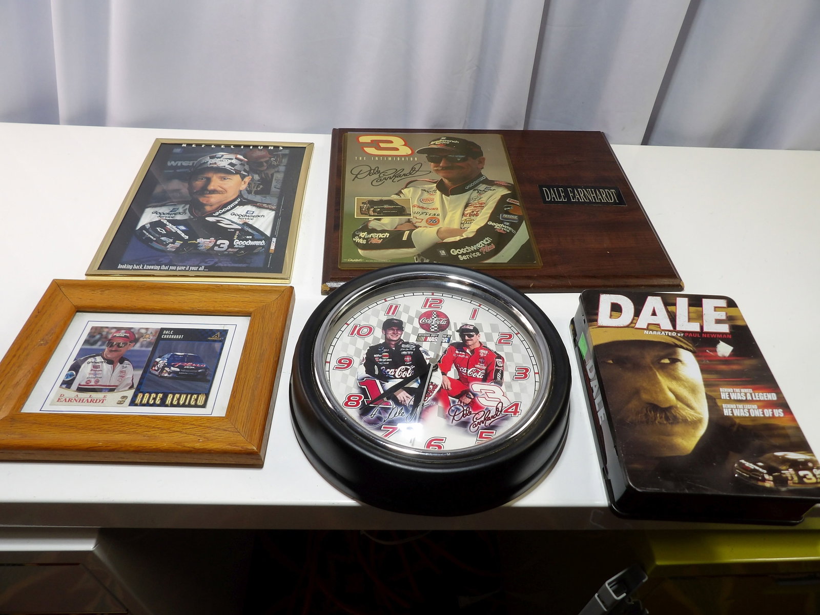 Lot of 5 Pieces Dale Earnhardt Memorabilia: Dale Earnhardt Lot of 5 Pieces, including One Signed Photo. All measurements approximate. Please see photos for condition and details. Selling as is from 04281.