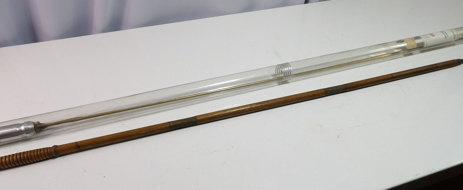 Shotgun and Rifle Cleaning Rods: Vintage Shotgun Cleaning Rod and Rifle Cleaning Rod. All measurements approximate. Please see photos for condition and details. Selling as is from 04281.