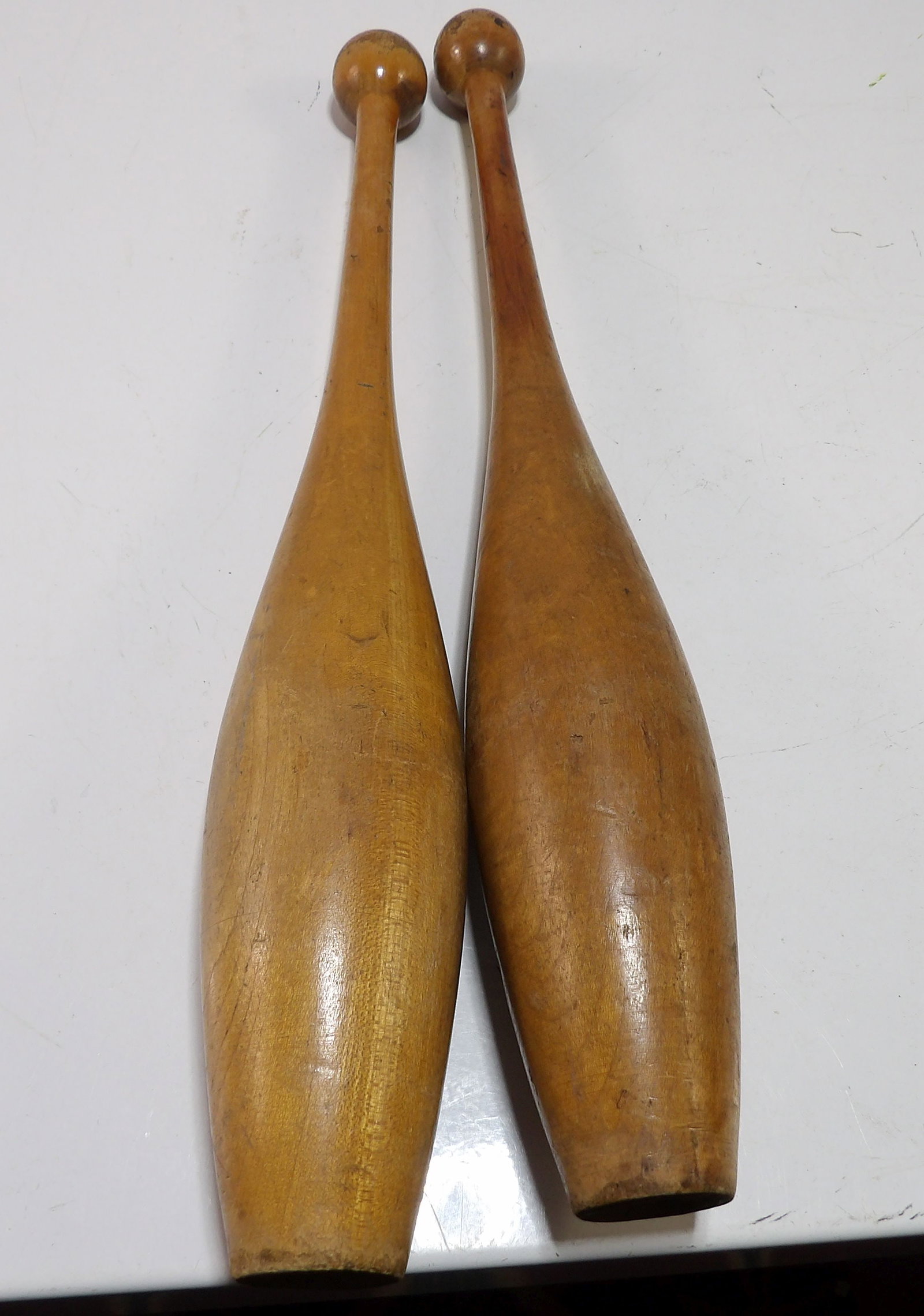 Pair of Vintage Indian Club Juggling Pins: Pair of Vintage Wooden Indian Clubs Juggling Pins, 14 1/2". All measurements approximate. Please see photos for condition and details. Selling as is from 04281.