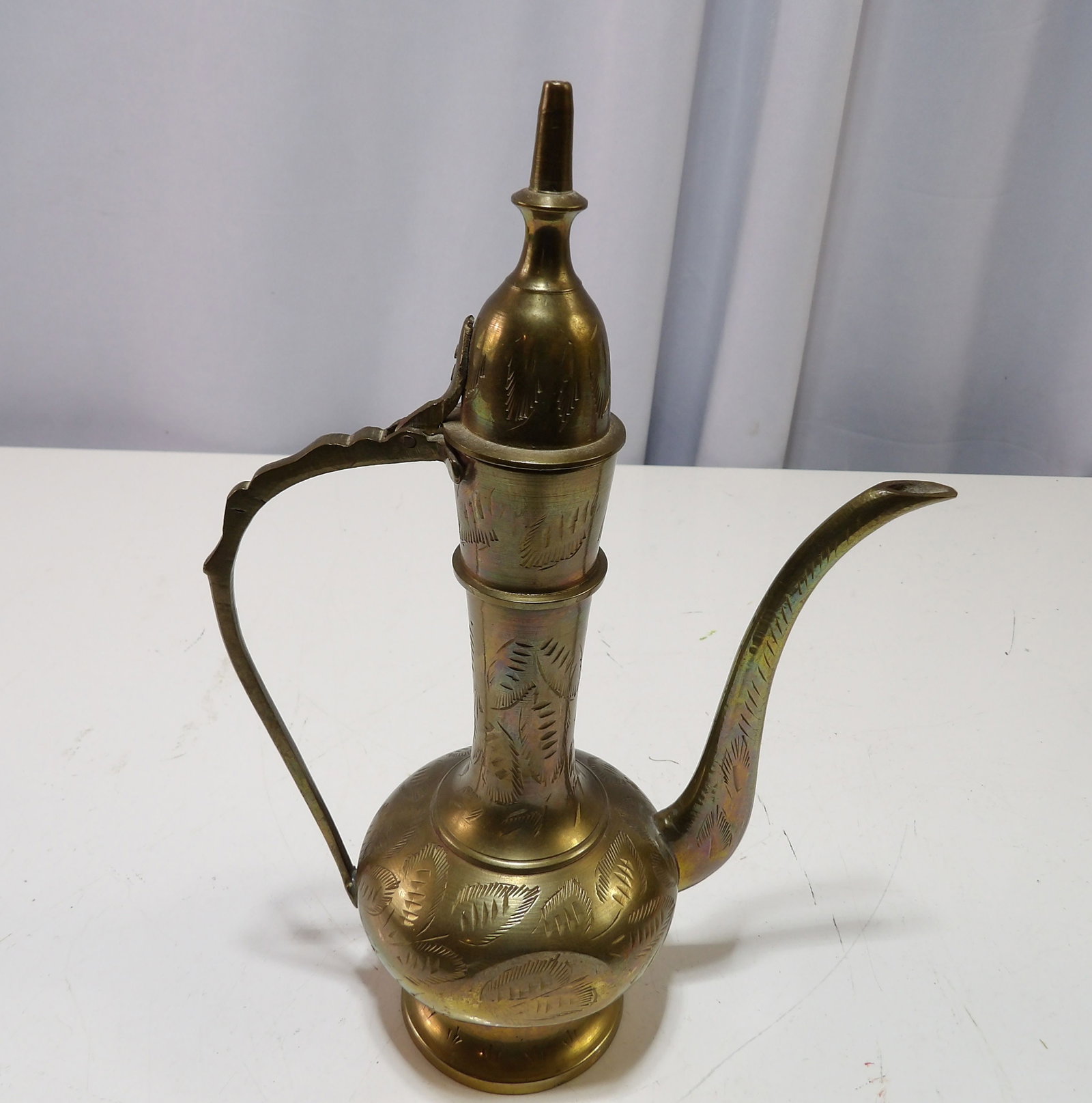 Hand Etched Brass Aftaba Tea Pot: Vintage Hand Etched Brass Aftaba Tea Pot with Hinged Top. All measurements approximate. Please see photos for condition and details. Selling as is from 04281.