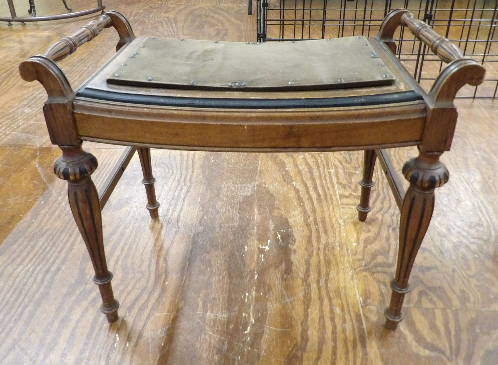Vintage Bench with Green Velvet Seat: Vintage Carved Wood Accent Bench with Green Velvet Seat. All measurements approximate. Please see photos for condition and details. Selling as is from 04281.