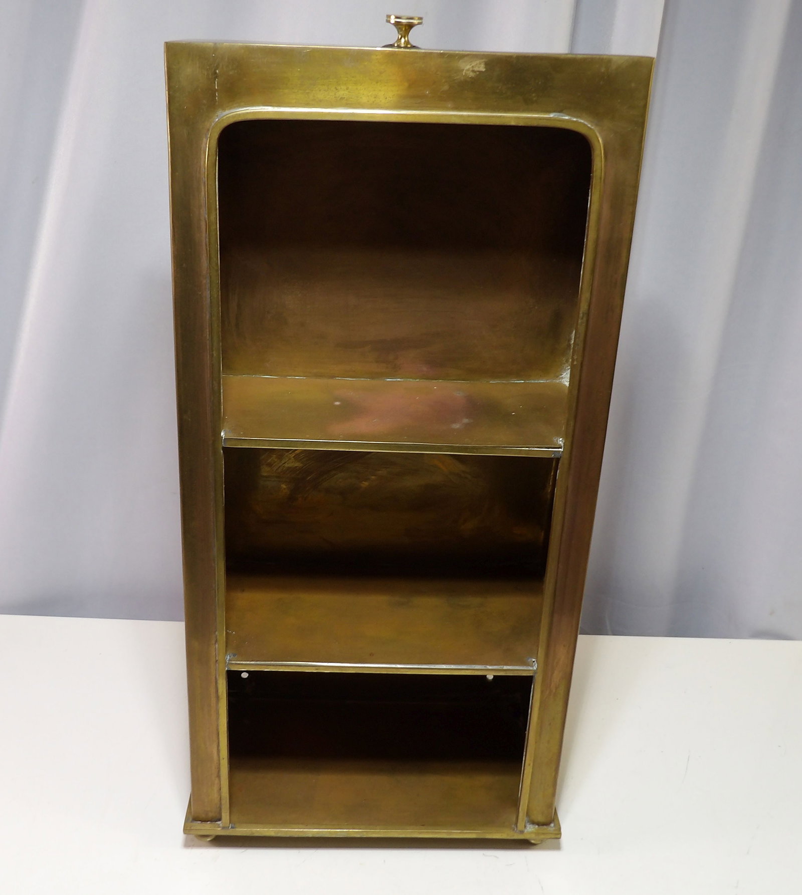 Hollywood Regency 3 Tier Wall or Table Display Shelf: Hollywood Regency Edward Alden Brass 3 Tiered Wall or Table Display Shelf. 9" Wide X 19" Tall. All measurements approximate. Please see photos for condition and details. Selling as is from 04281.