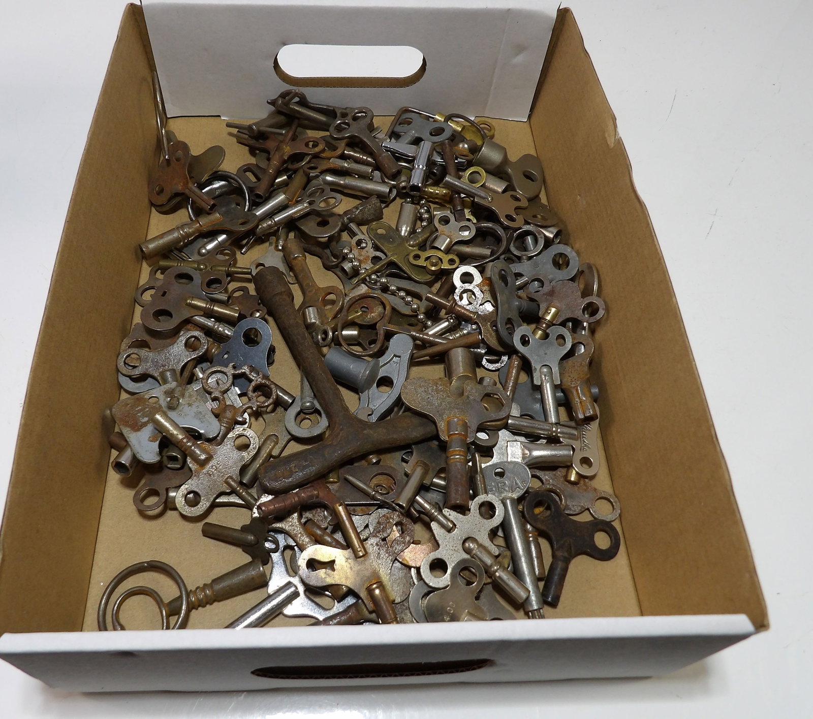 Large Assortment of Clock Keys: Large Assortment of Vintage Clock Keys. All measurements approximate. Please see photos for condition and details. Selling as is from 04281.