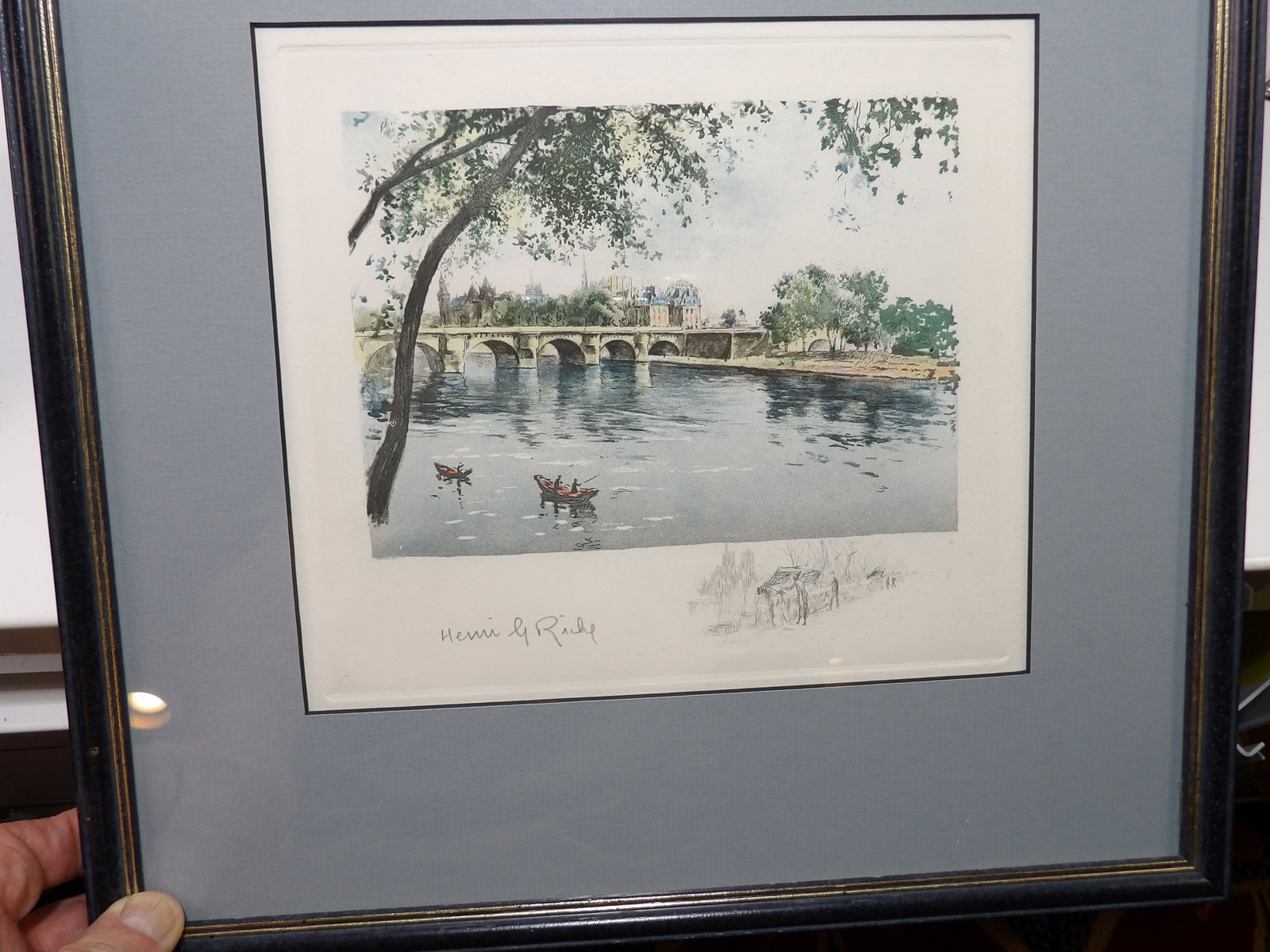 Henri Le Riche French Color Print of Pont Neuf: Henri Le Riche French Color Print of Pont Neuf Paris with Boats, 14" X 14". All measurements approximate. Please see photos for condition and details. Selling as is from 04281.