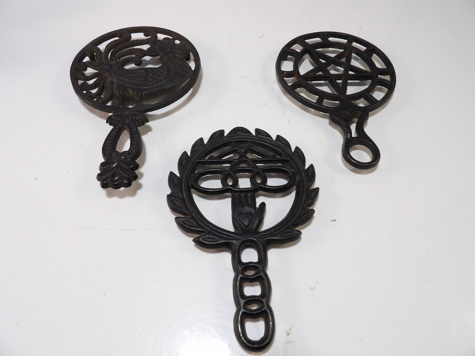 Set of 3 Cast Iron Trivets (1 of 4)