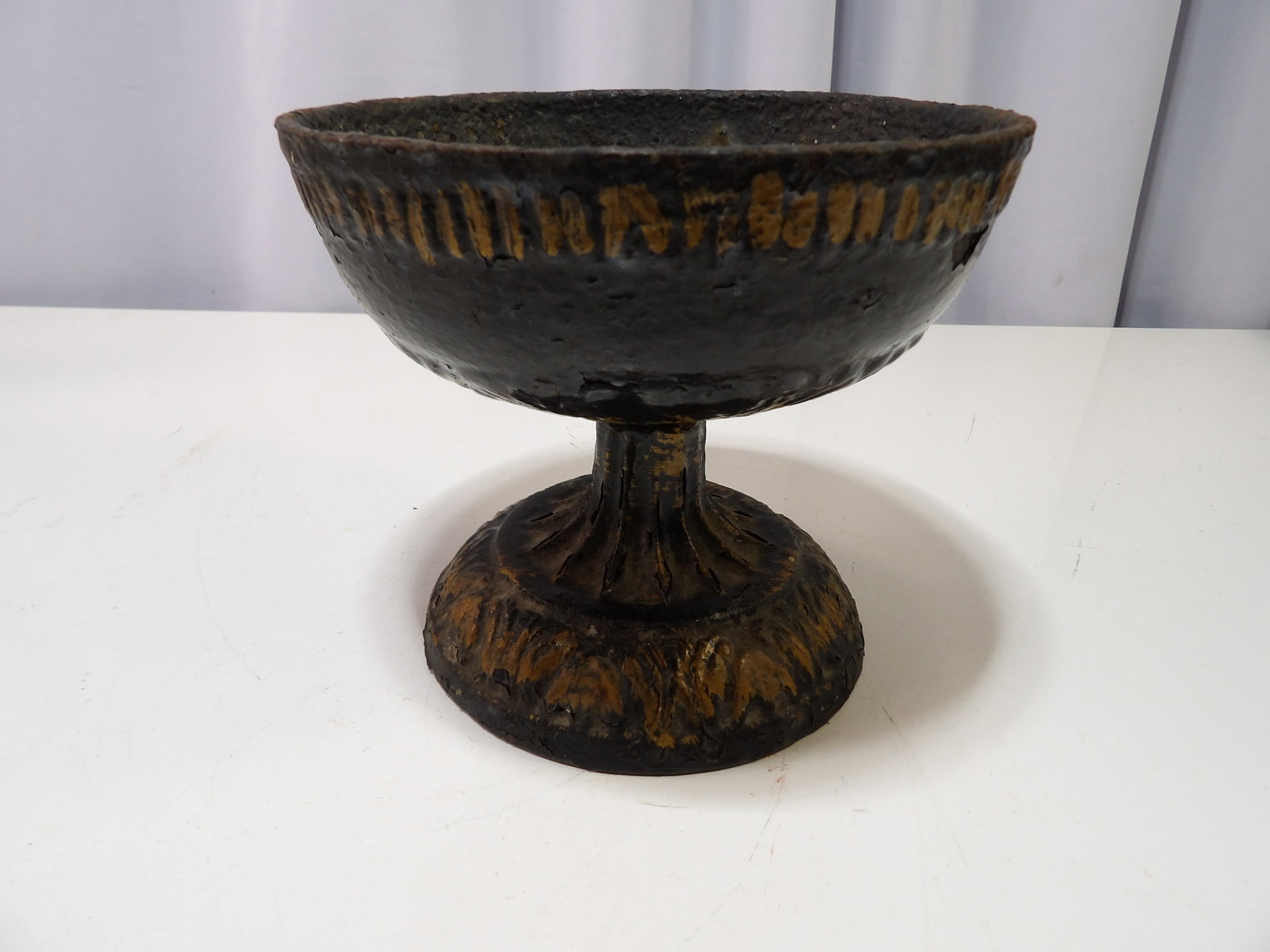 Cast Iron Pedestal Bowl: Vintage Cast Iron Pedestal Bowl with Ribbed Pattern. 6" Diameter. All measurements approximate. Please see photos for condition and details. Selling as is from 04281.