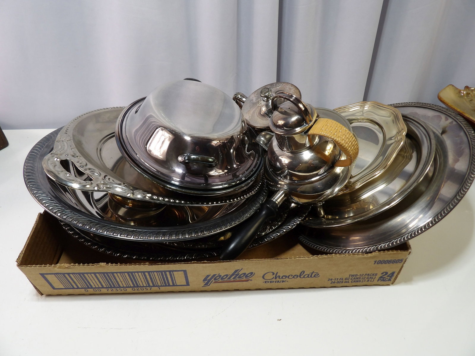 Assorted Silver Plated Serving Ware: Assorted Vintage Silver Plated Serving Ware. including Trays, Dishes, Teapots, etc. All measurements approximate. Please see photos for condition and details. Selling as is from 04281.